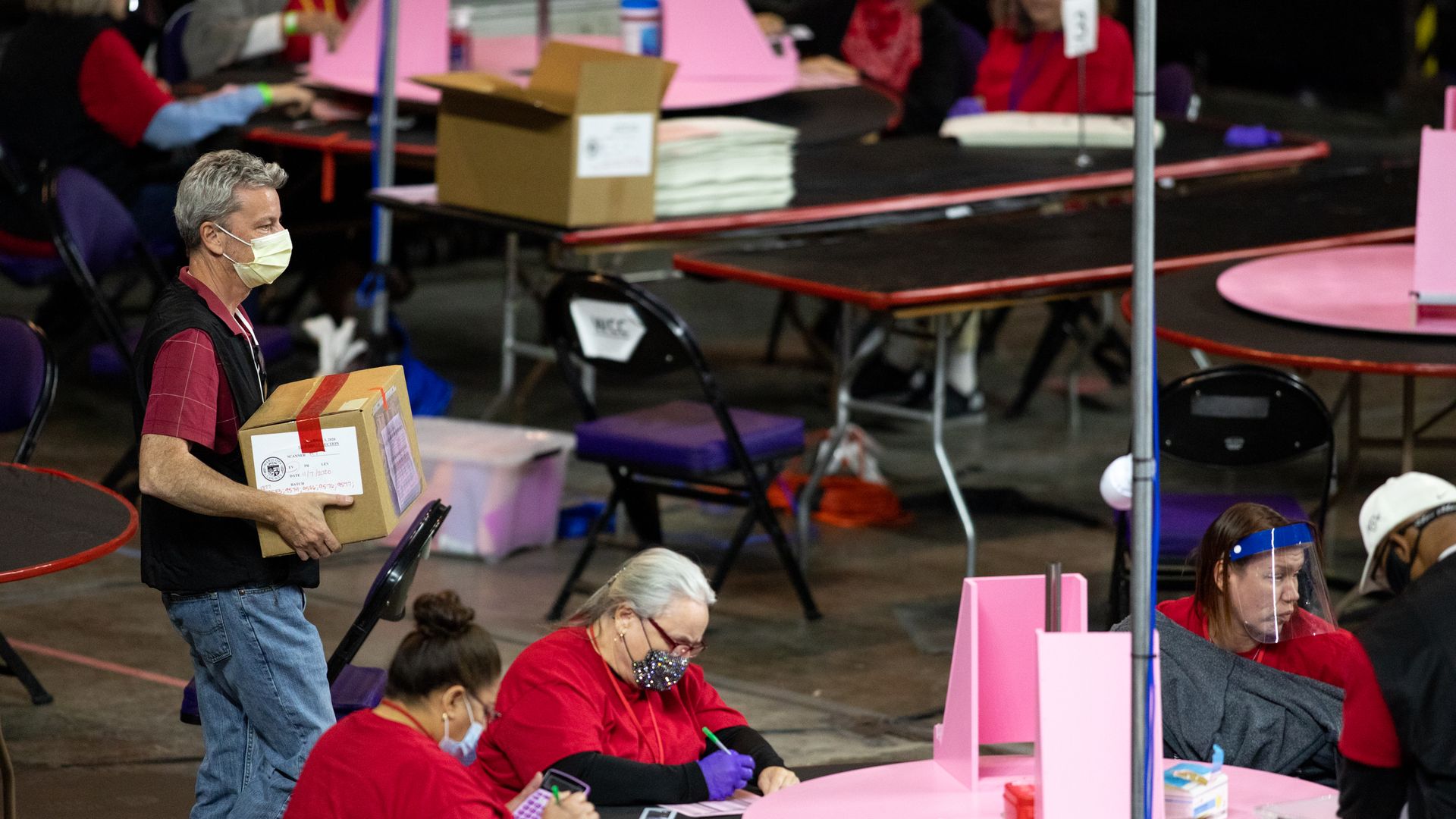Contractors in Phoenix in May 2021 recounting ballots as part of a 2020 general election audit requested by the Arizona State Senate.