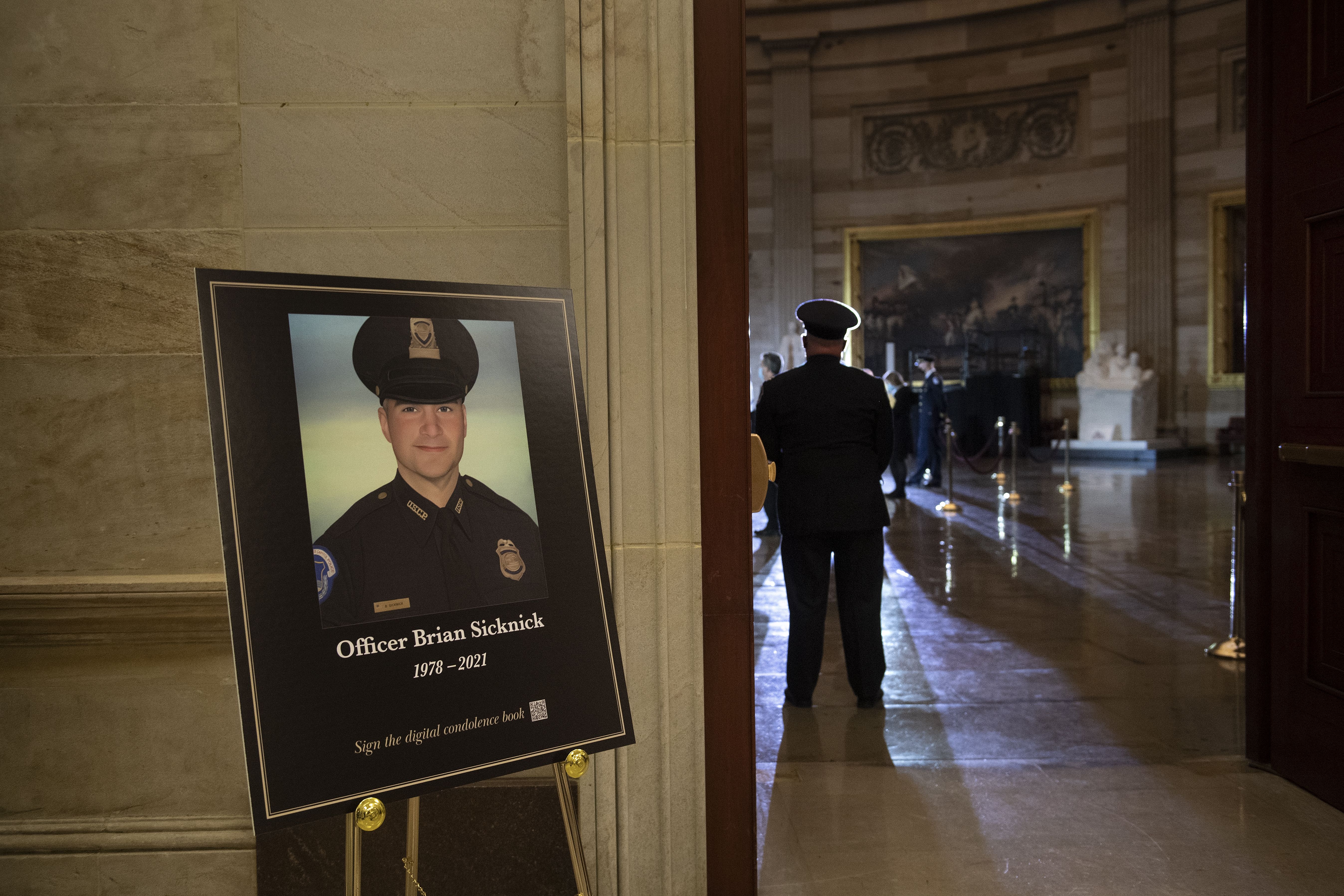 A photograph of the late U.S. Capitol Police Officer Brian Sicknick in the U.S. Capitol in Washington, D.C., U.S., on Tuesday, Feb. 2