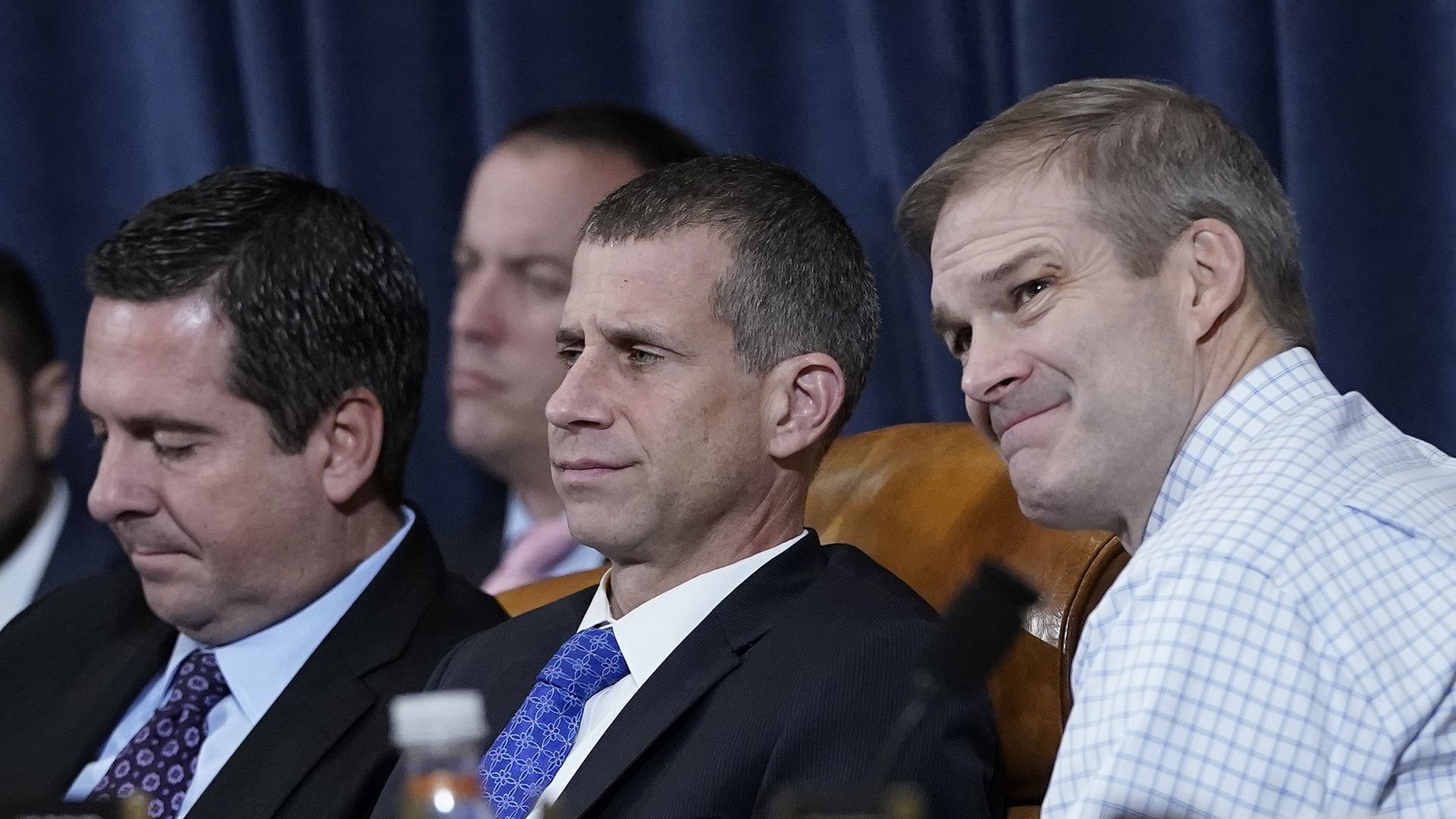 House Republican Reps. Devin Nunes and Jim Jordan and lawyer Steve Castor listed during an impeachment hearing last month.