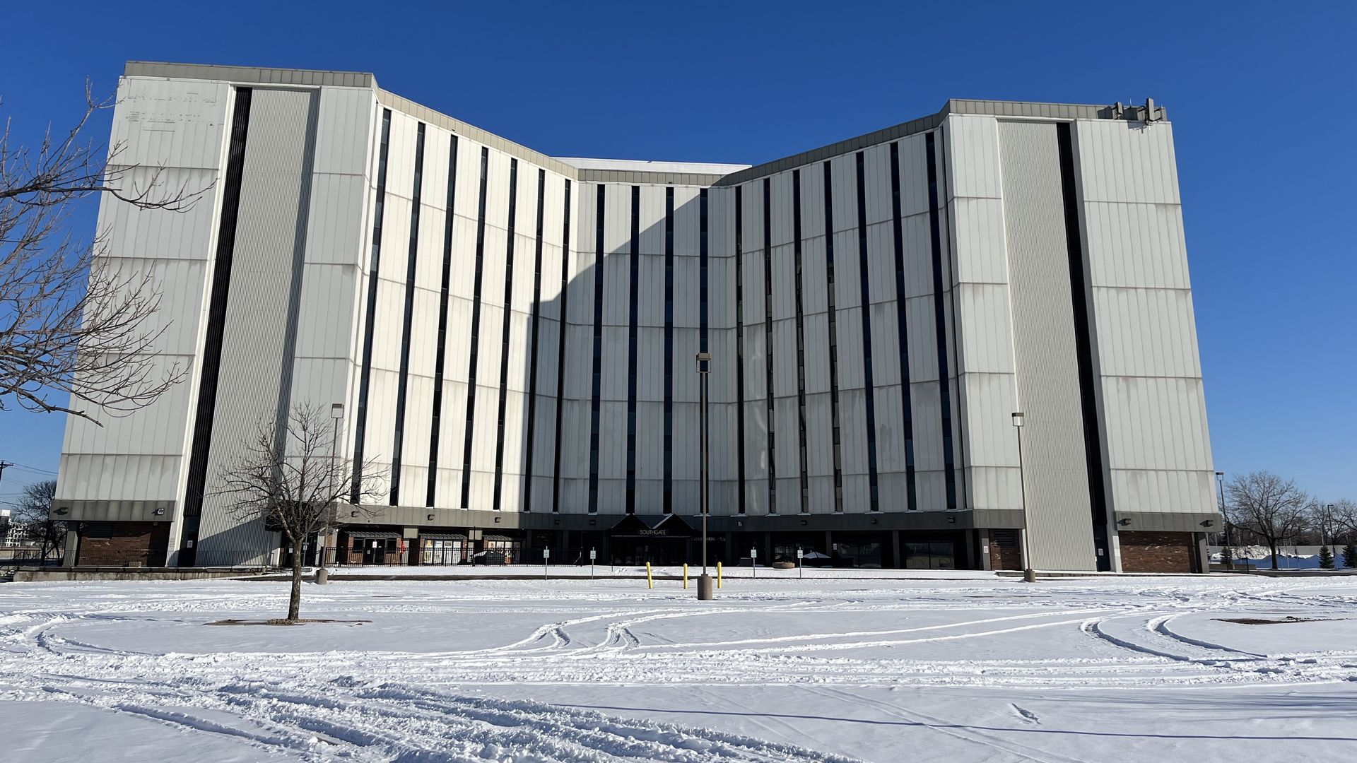 An office building with unplowed snow