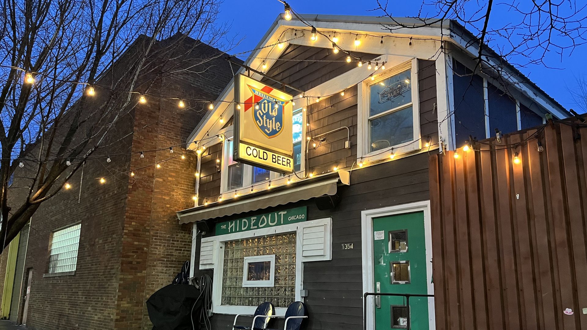 wood frame house at night