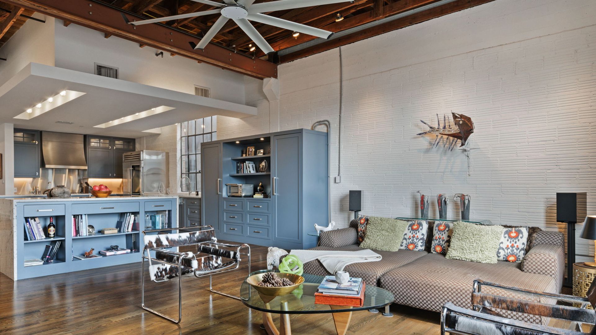 A Southtown loft with exposed beams, large windows and longleaf pine hardwoods.