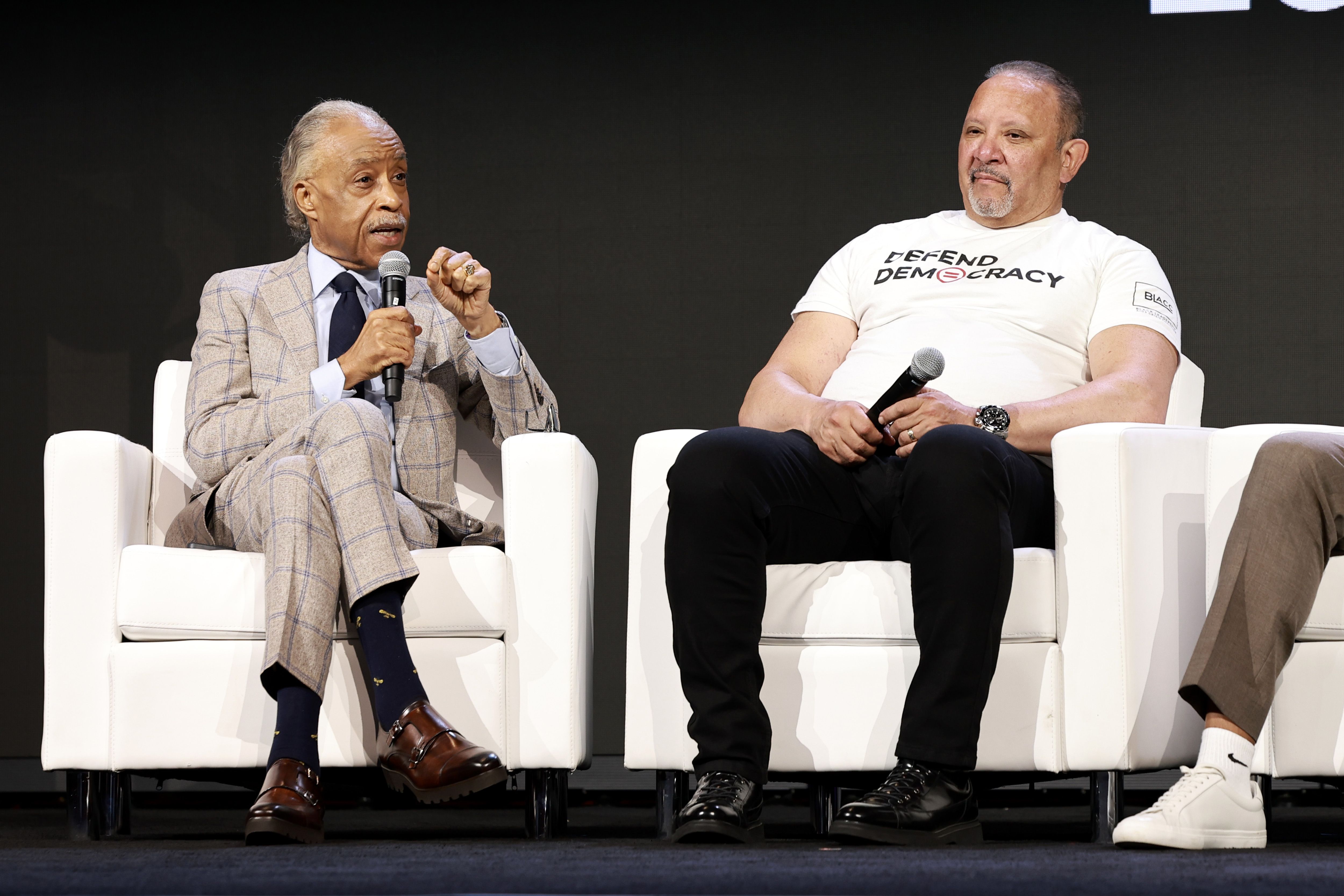 Photo shows Al Sharpton and Marc Morial.