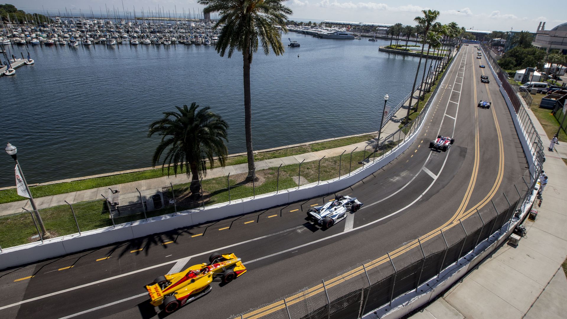  A pack of cars races down a waterfront street during the Firestone Grand Prix of Saint Petersburg IndyCar race 