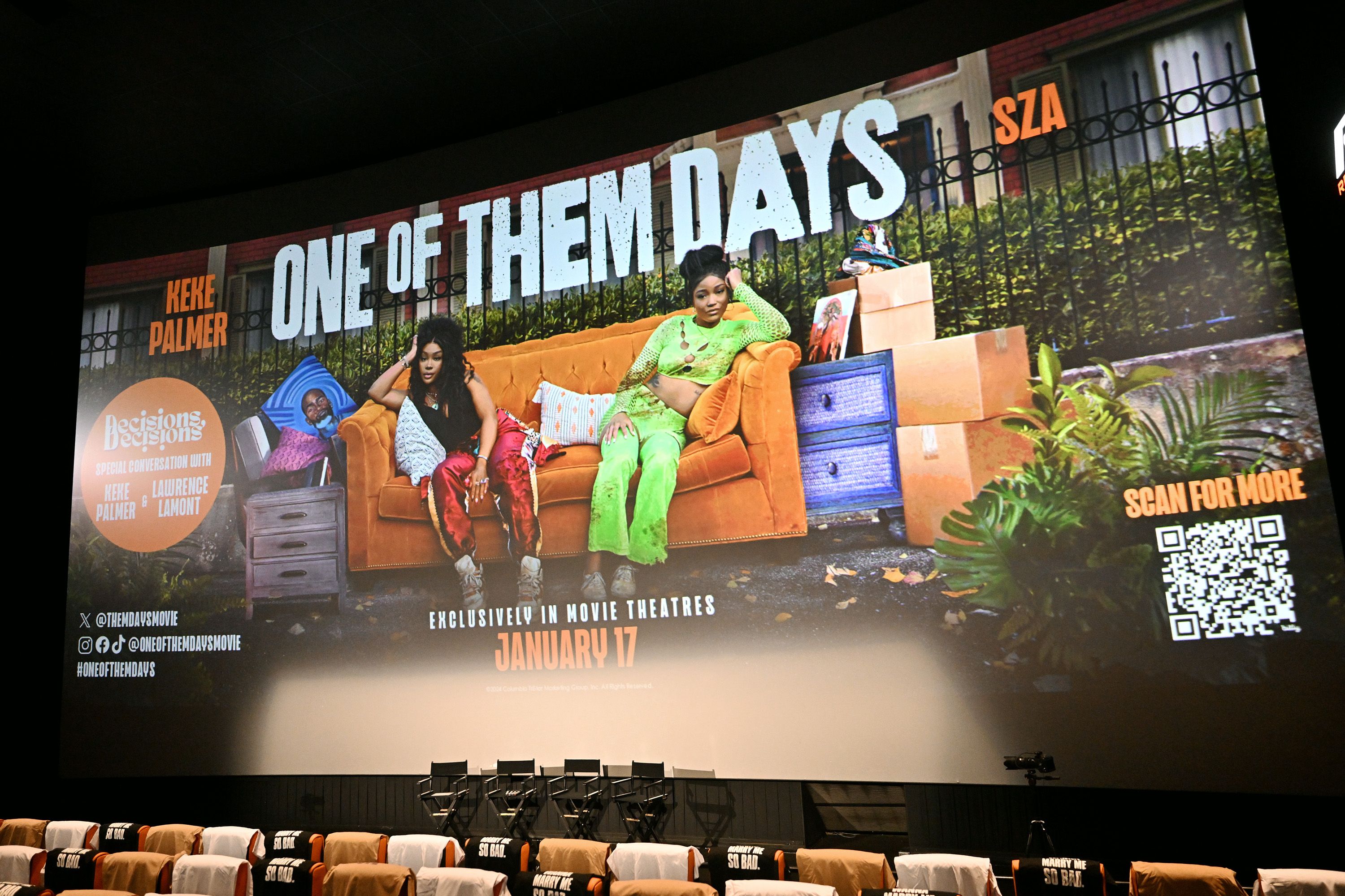 A view of an advertisement for the movie with the two main characters lounging on a couch.