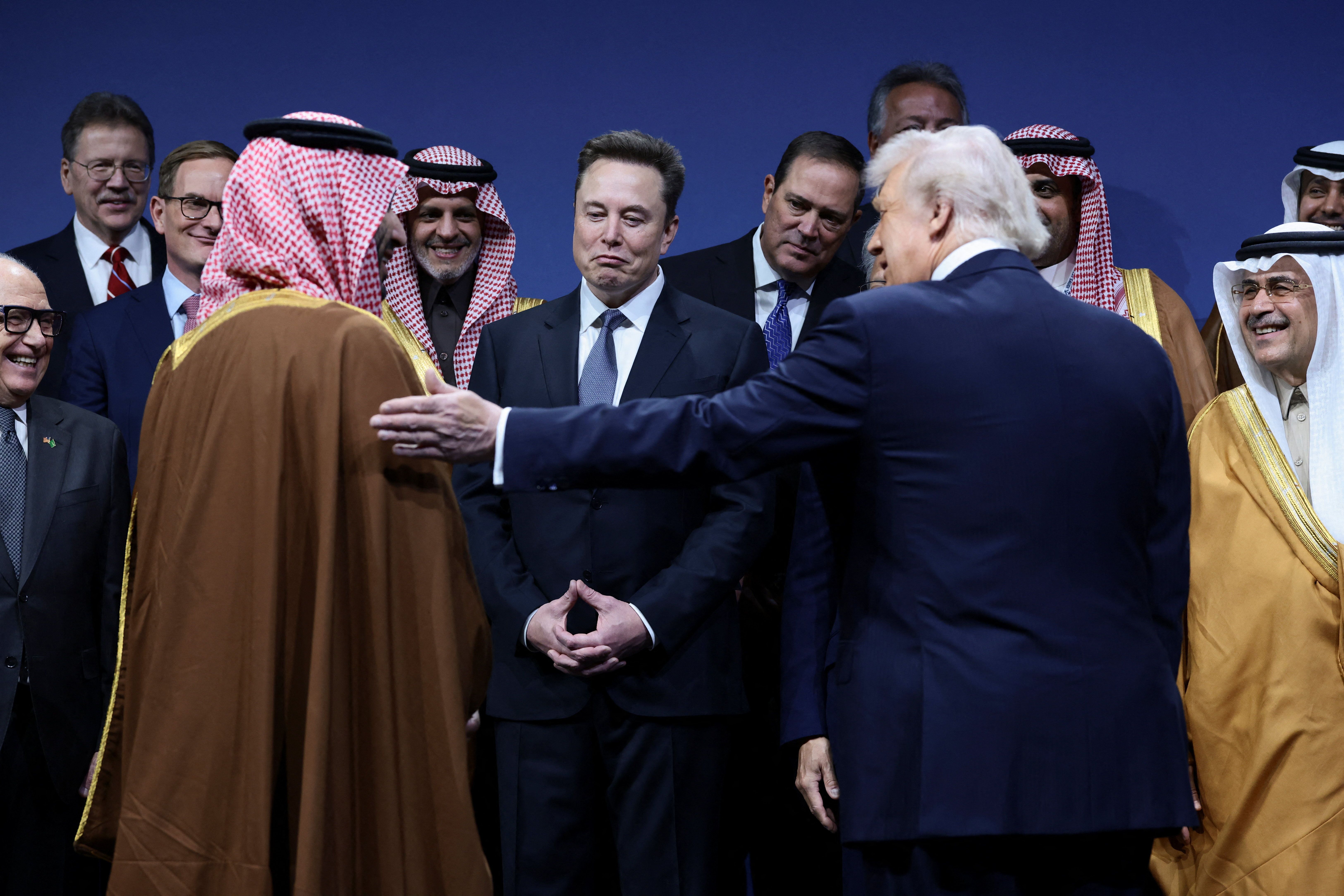 President Trump, Saudi Crown Prince Mohammed bin Salman and Elon Musk talk at a Saudi investment conference in D.C. yesterday.