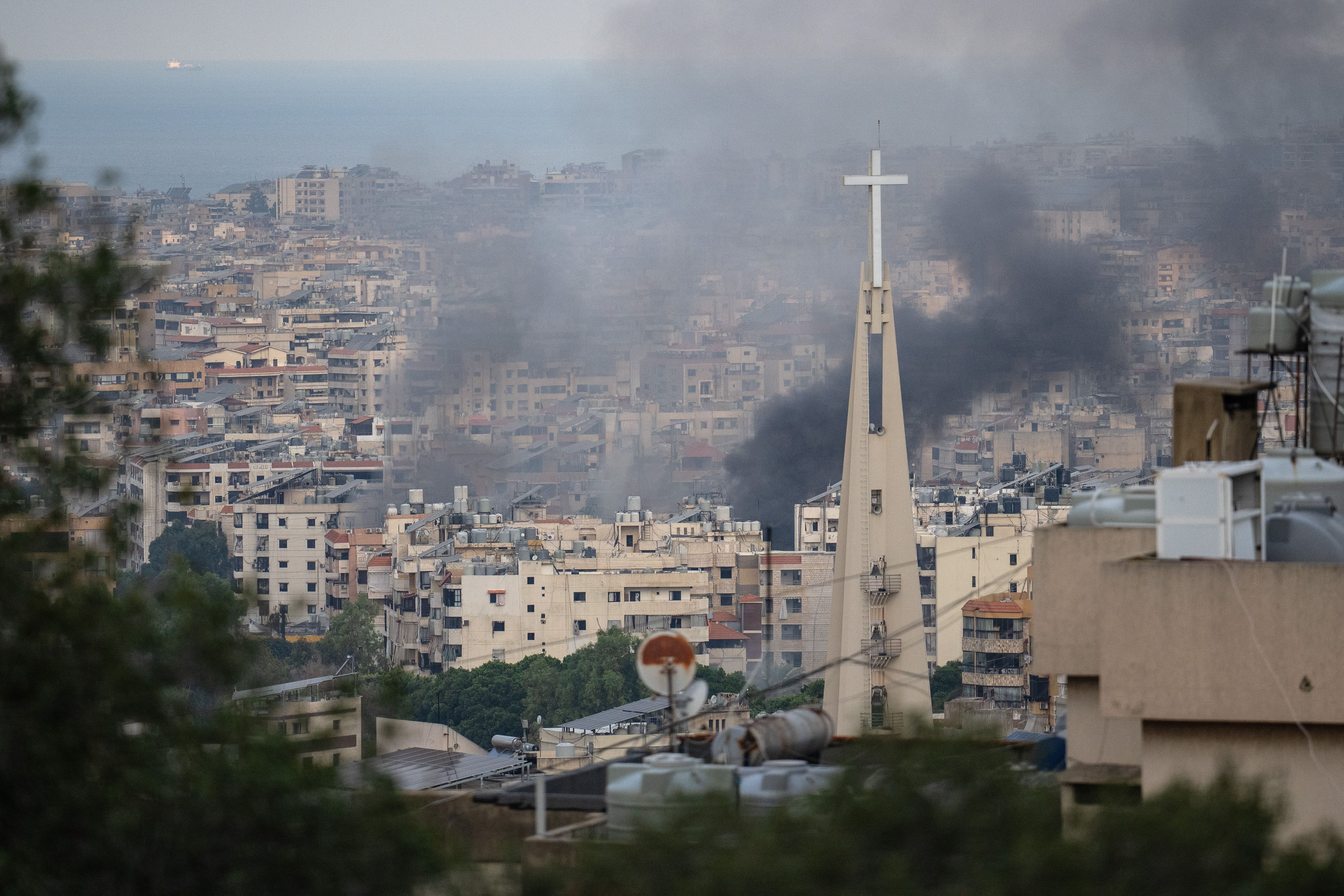 Smoke is seen above Beirut from Israeli airstrikes. 