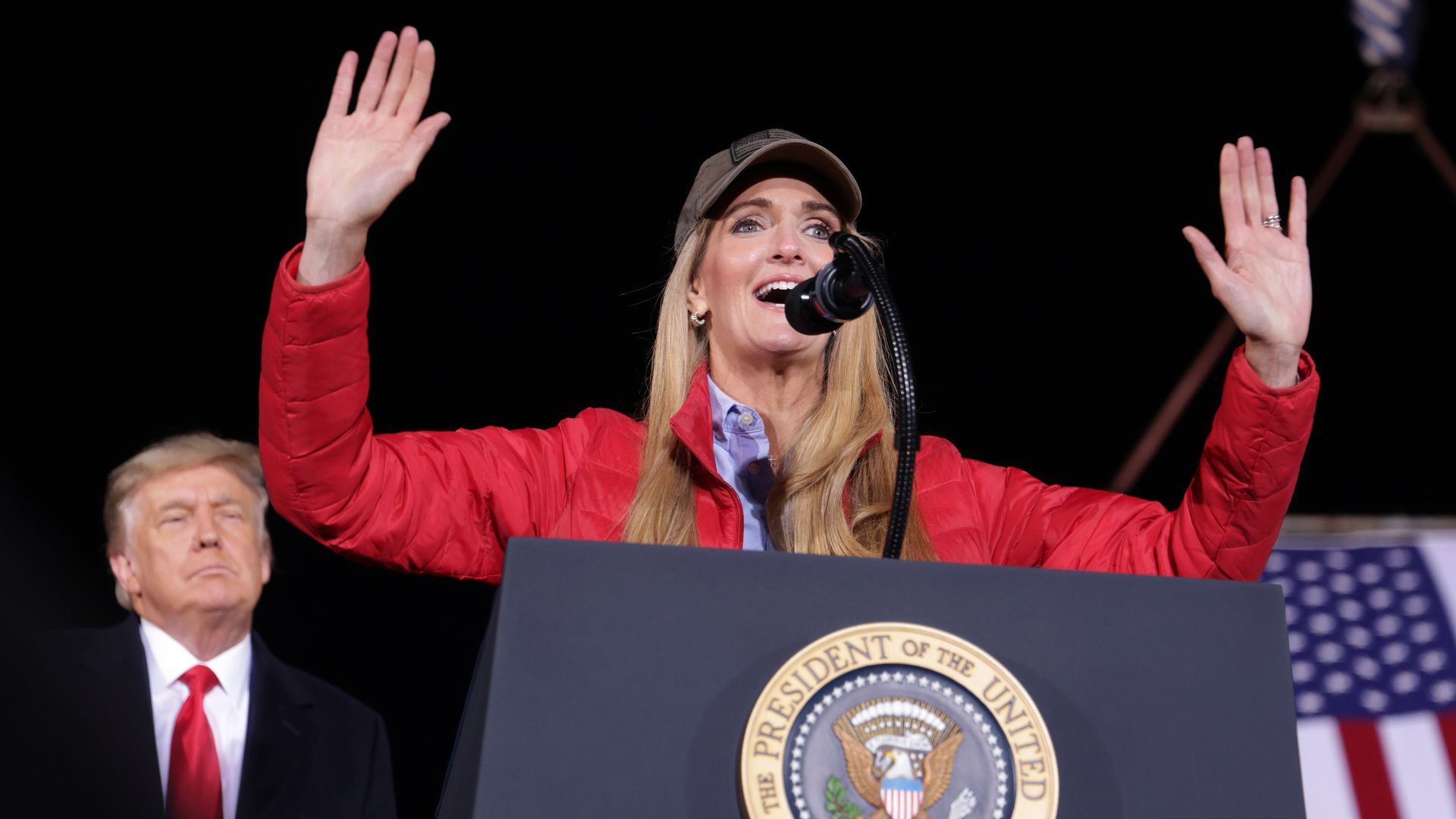 Sen. Kelly Loeffler (R-GA) speaks at a campaign rally as President Donald Trump looks on at Dalton Regional Airport January 4, 2021 in Dalton, Georgia.