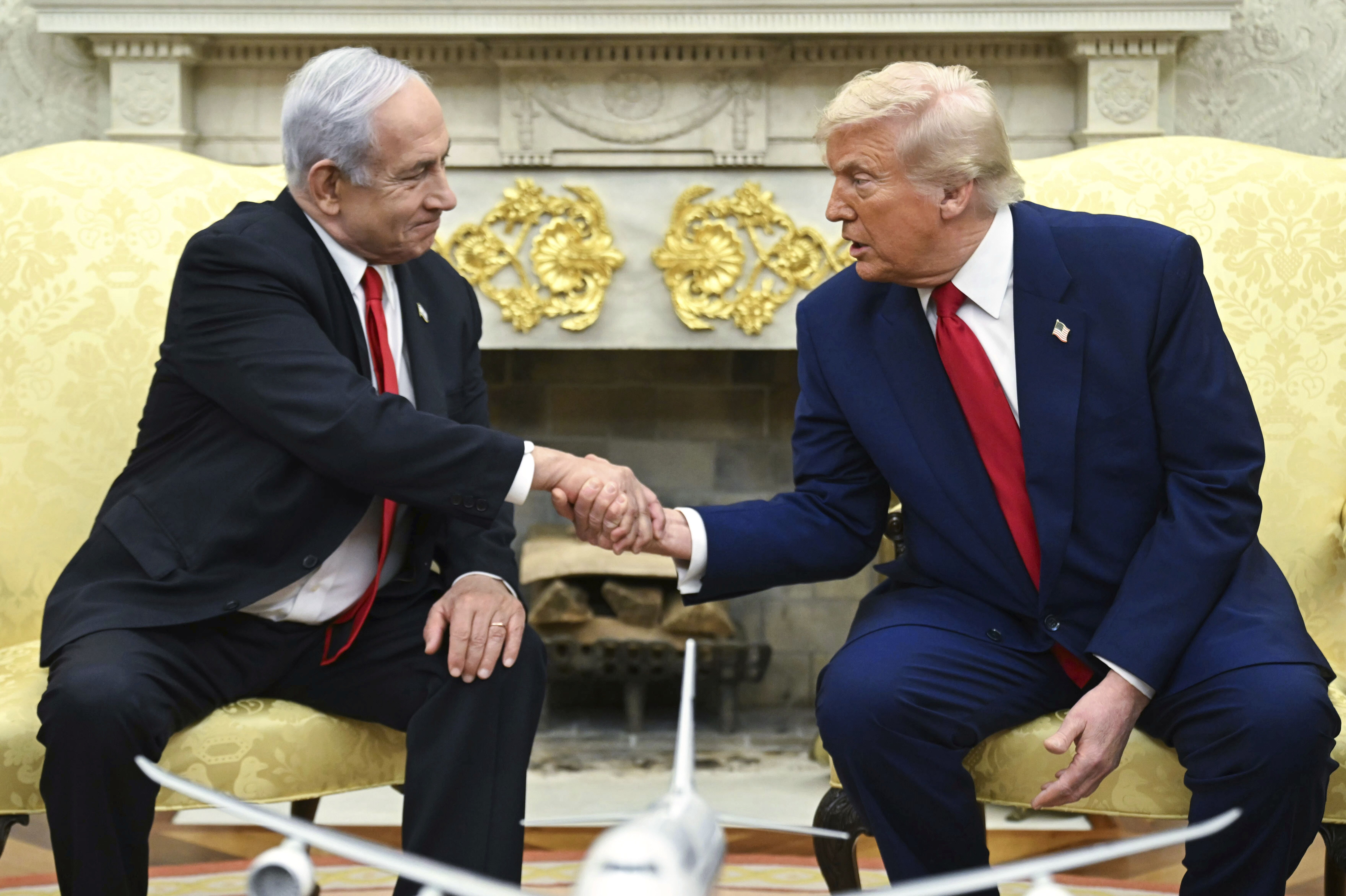 President Trump shakes Israeli Prime Minister Benjamin Netanyahu's hand in the Oval Office in April.