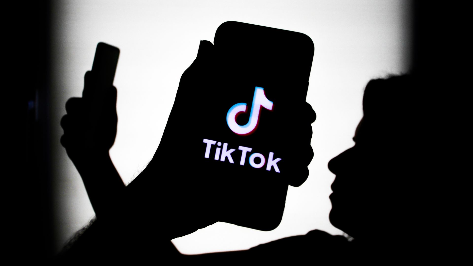 TikTok logo displayed on a phone screen is seen in this illustration photo taken in Krakow, Poland on July 18, 2021. 