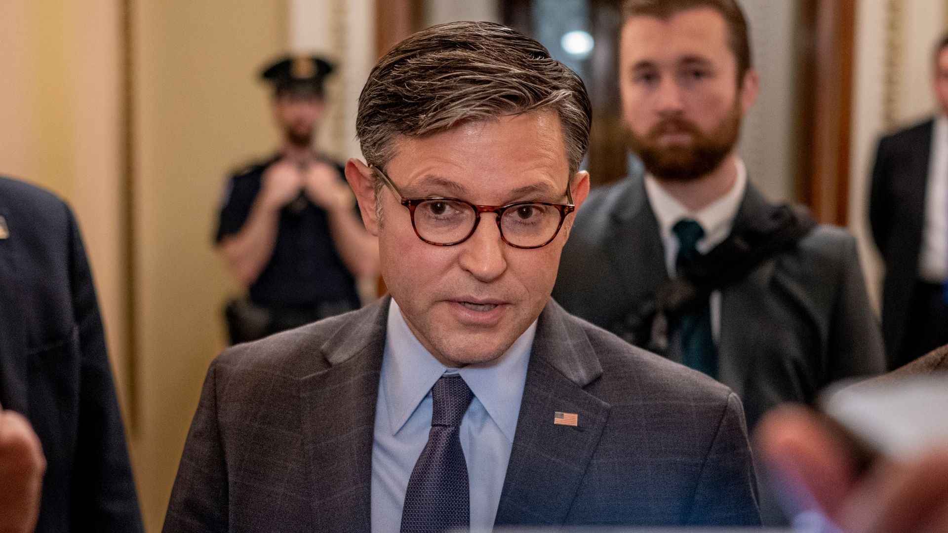 Speaker Mike Johnson leaves the House Chamber during a vote on Sept. 19. 