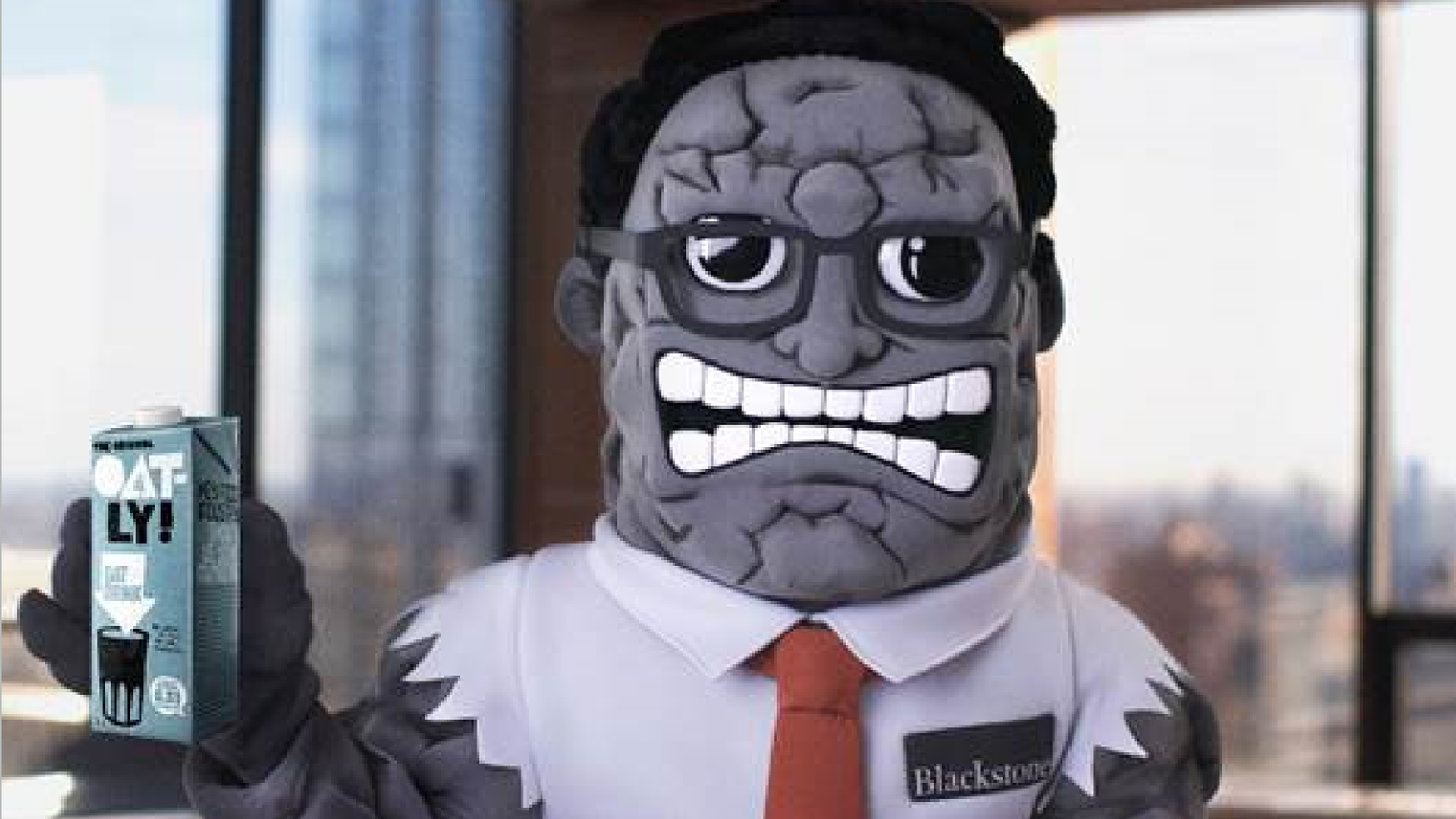 The Blackstone mascot holding Oatly