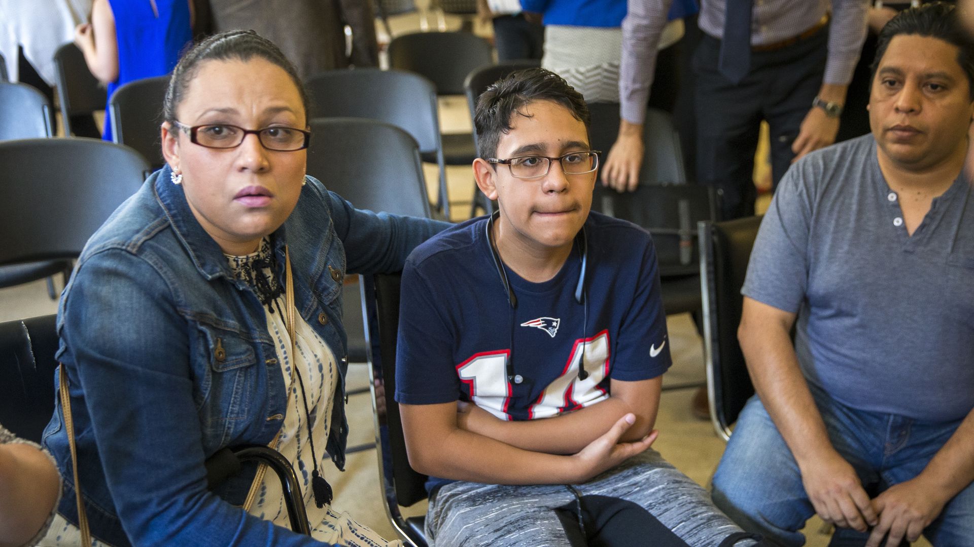 A migrant in a wheelchair who would have been impacted by the ending of a medical deferred action program.