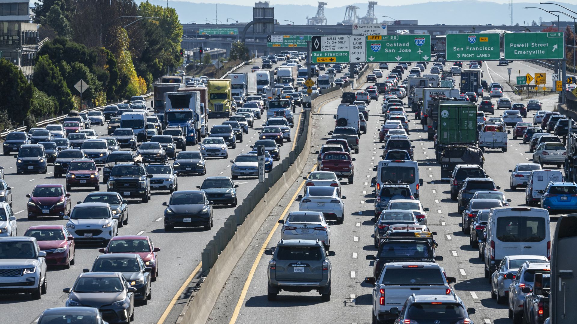 Traffic moves along Interstate 80 in Emeryville, California, US, on Wednesday, Nov. 27, 2024. AAA projects 79.9 million travelers will head 50 miles or more from home over the Thanksgiving holiday travel period. Photographer: David Paul Morris/Bloomberg via Getty Images