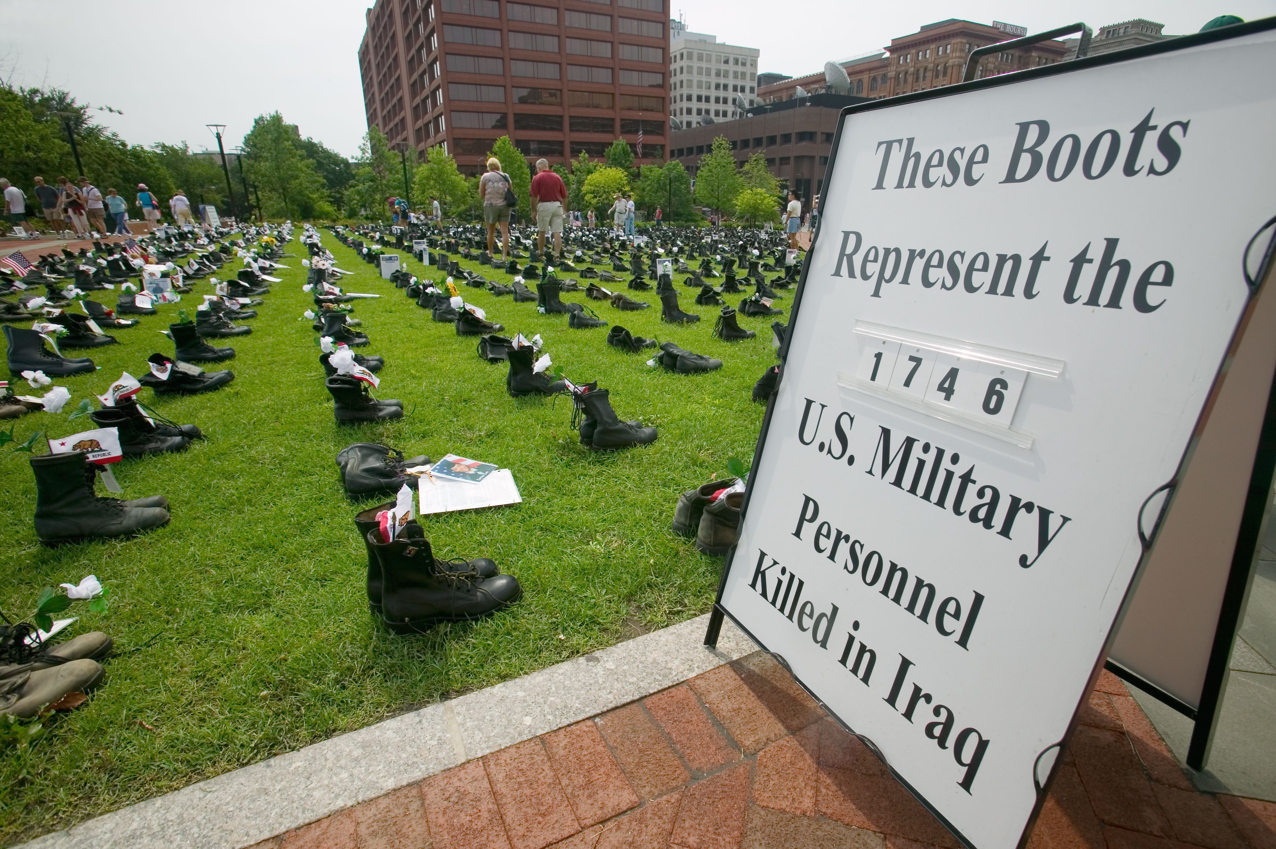 Military boots symbolizing US Military Personnel killed in Iraq as displayed at Independence Hall "Eyes Wide Open" exhibit, Philadelphia, Pennsylvania on July 4, 2005