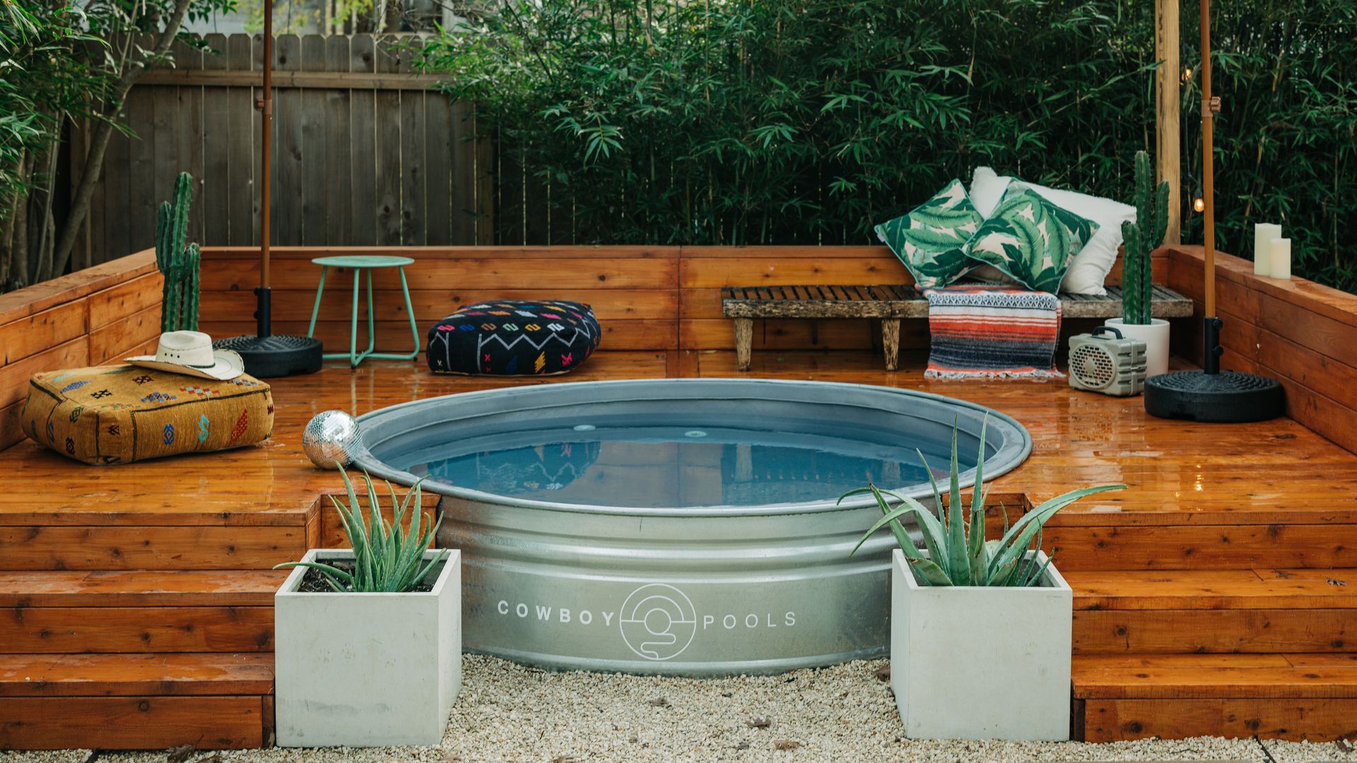 steel trough pool surrounded by a deck