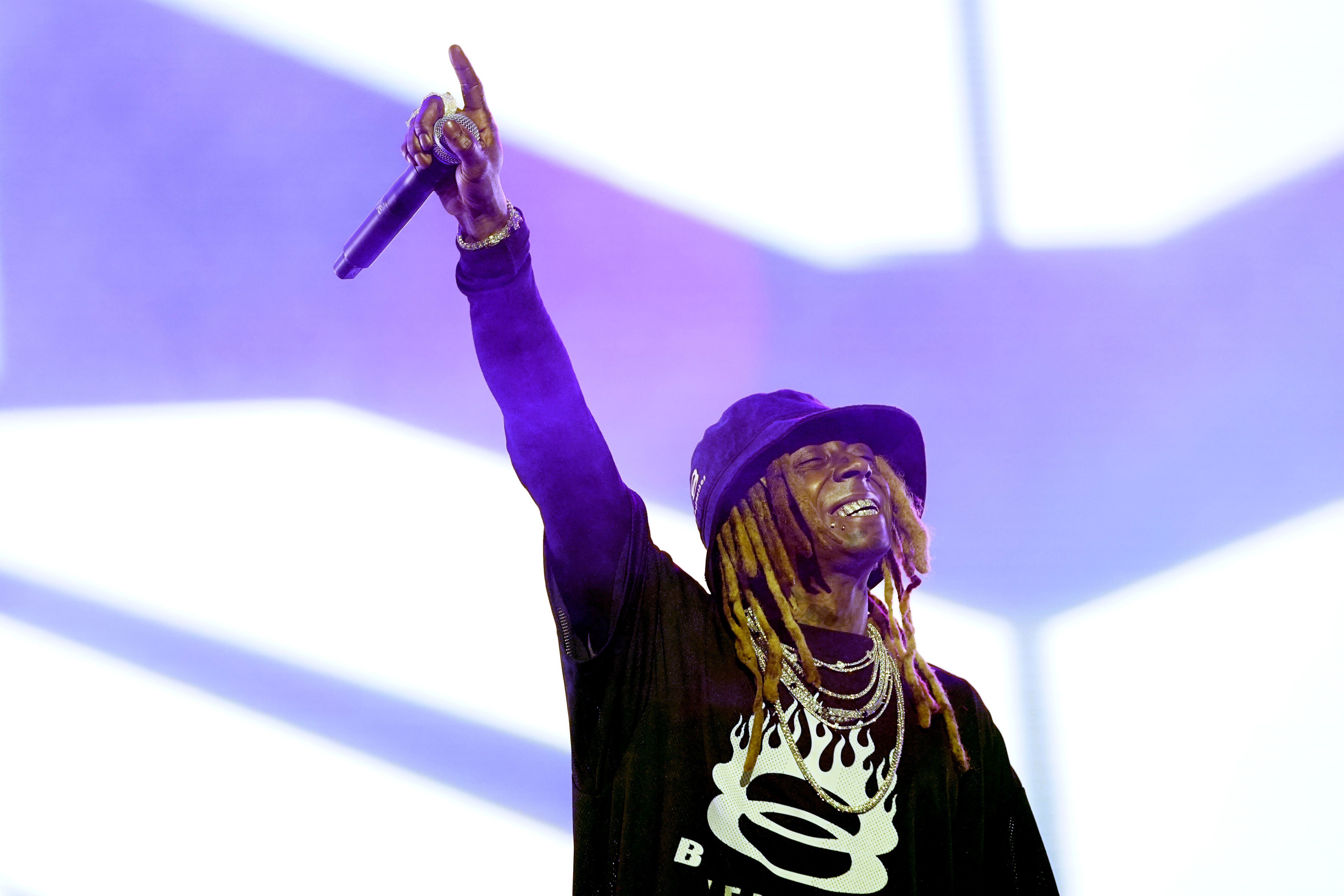 Photo shows Lil Wayne performing at Essence.