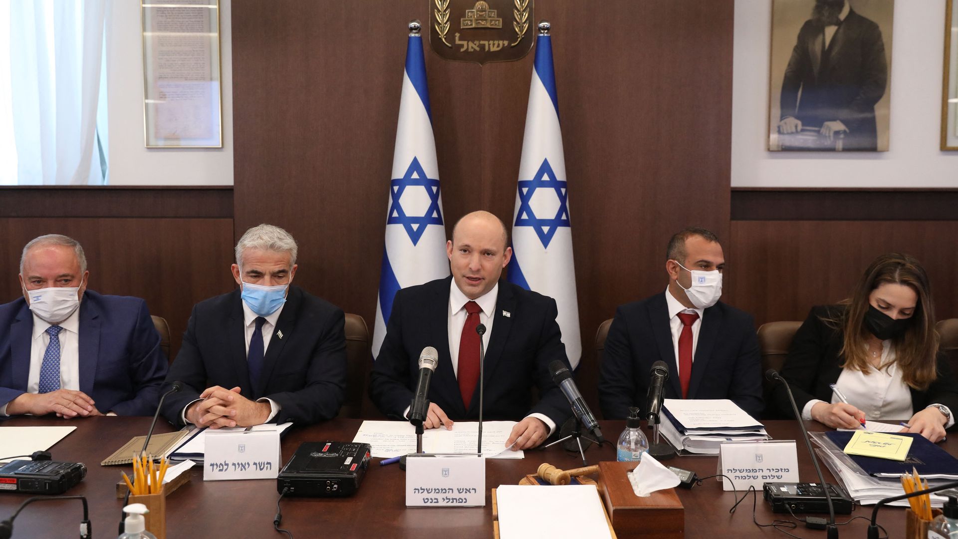  Israel's Finance Minister Avigdor Lieberman (L), Foreign Minister Yair Lapid, and Prime Minister Naftali Bennett (C) attend the weekly cabinet meeting in Jerusalem on August 1