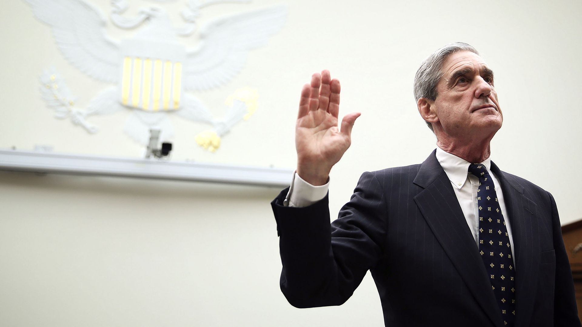 Bob Mueller raises hand.