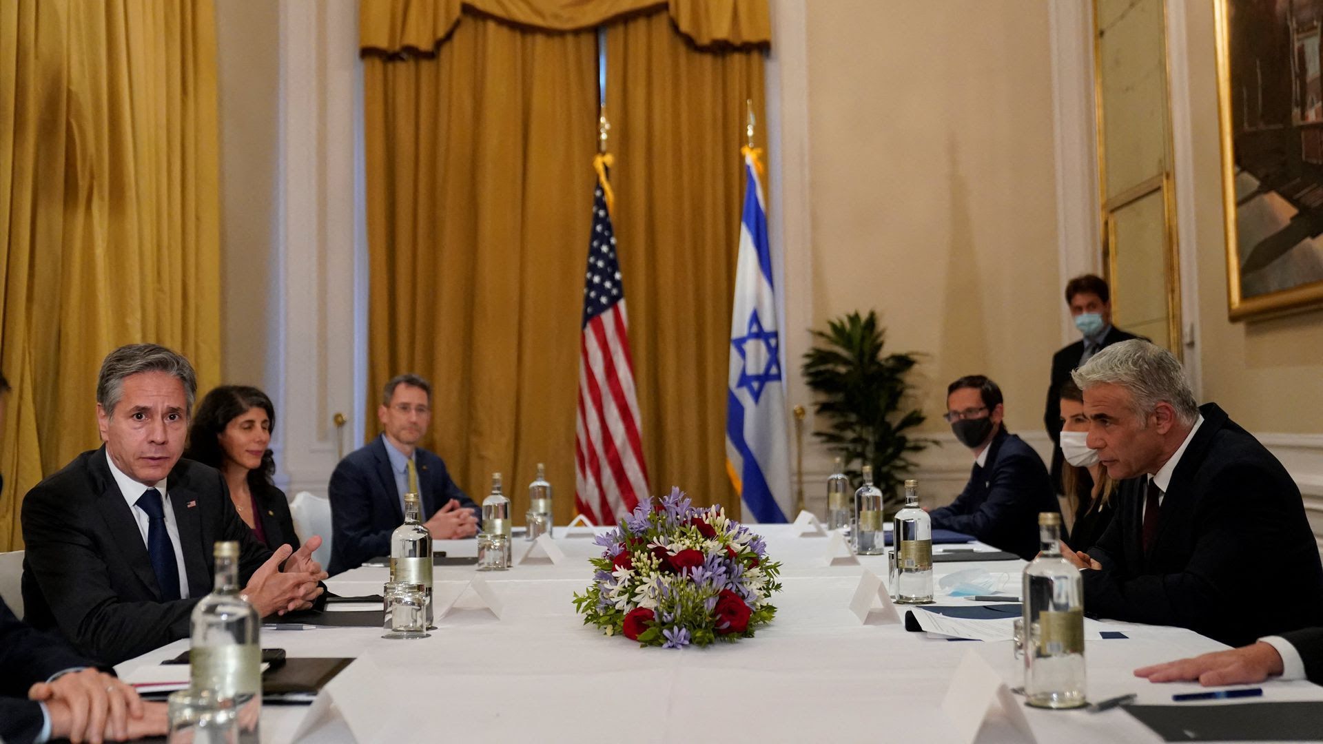 Tony Blinken (L) meets with Yair Lapid (R) in Rome, June 27.