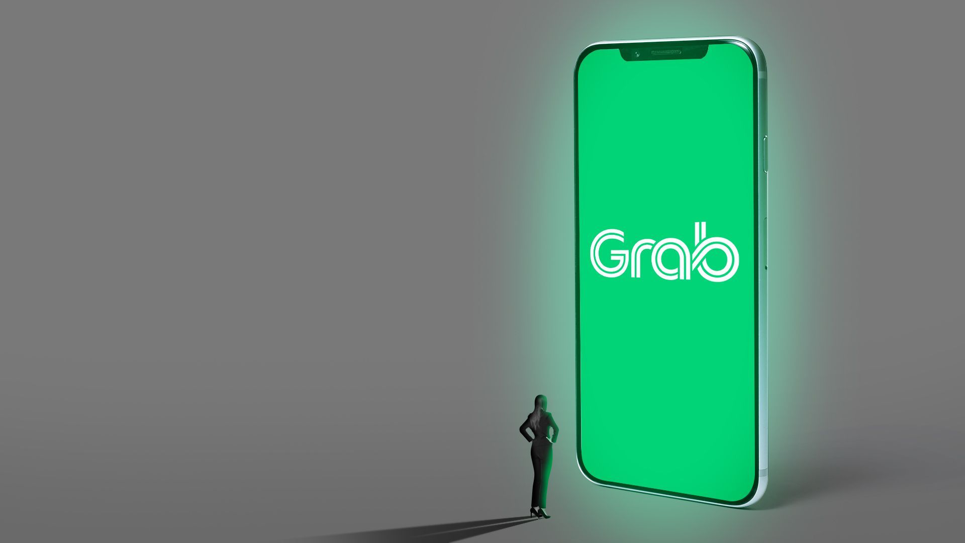Illustration of a small business woman in front of a huge glowing phone displaying the Grab app logo.