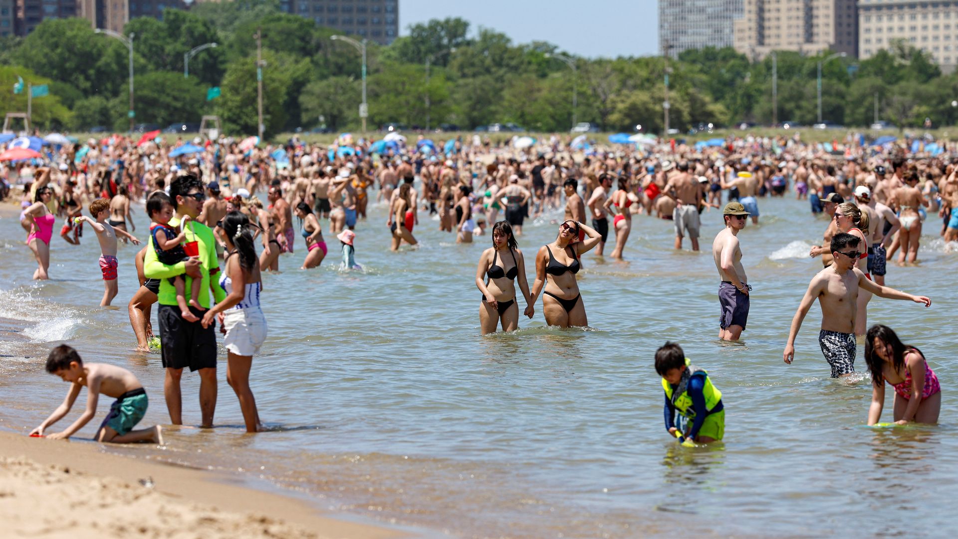 Beachgoers cool off at the North Avenue Beach