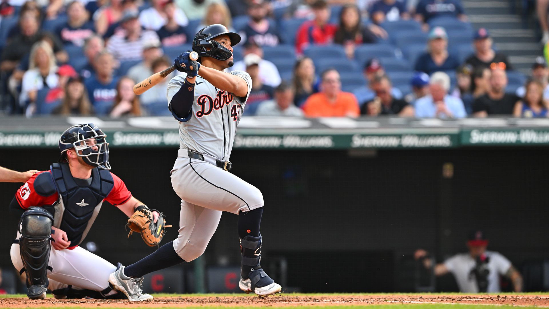 The Tigers' Wenceel Pérez watches a two-run homer clear the center field fence against the Guardians. 