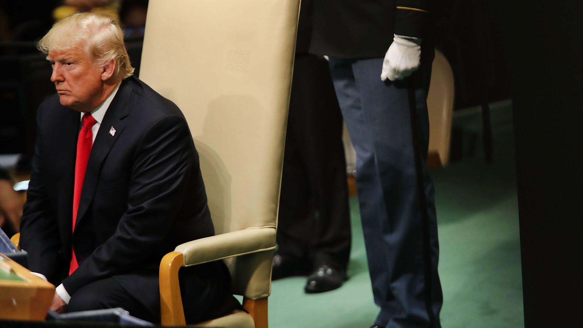 President Trump sitting in a chair.