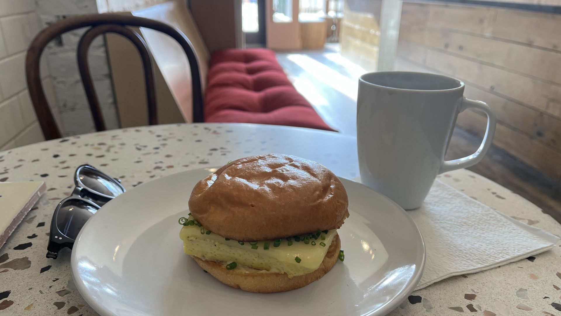 Alba's egg sandwich with coffee.