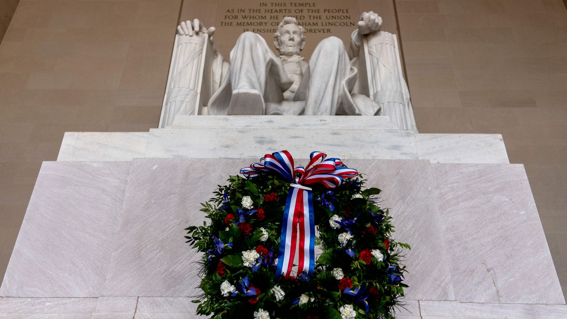 A wreath is seen at the foot of the statue of Abraham Lincoln on what would have been his 213th birthday.