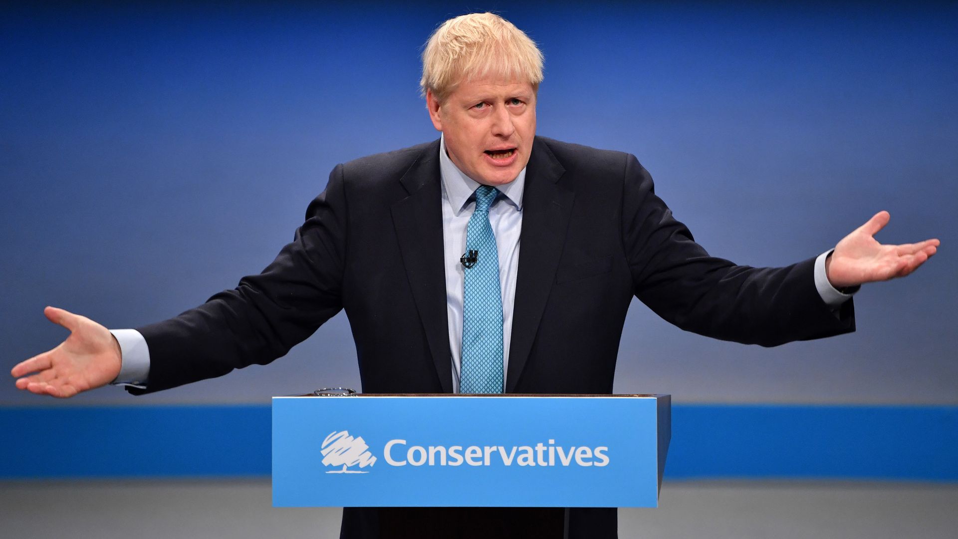 Britain's Prime Minister Boris Johnson delivers his keynote speechat the annual Conservative Party conference in Manchester, north-west England on October 2