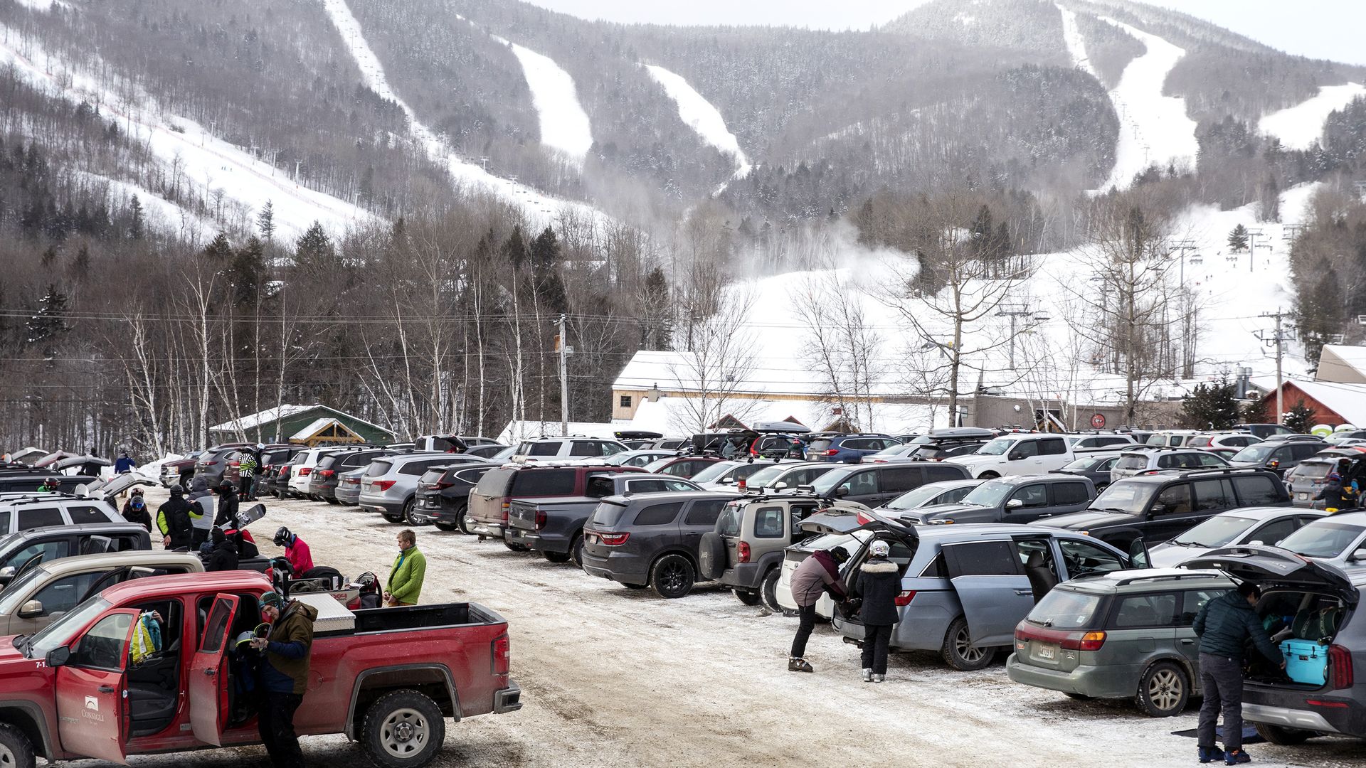 Skiiers in parking lot