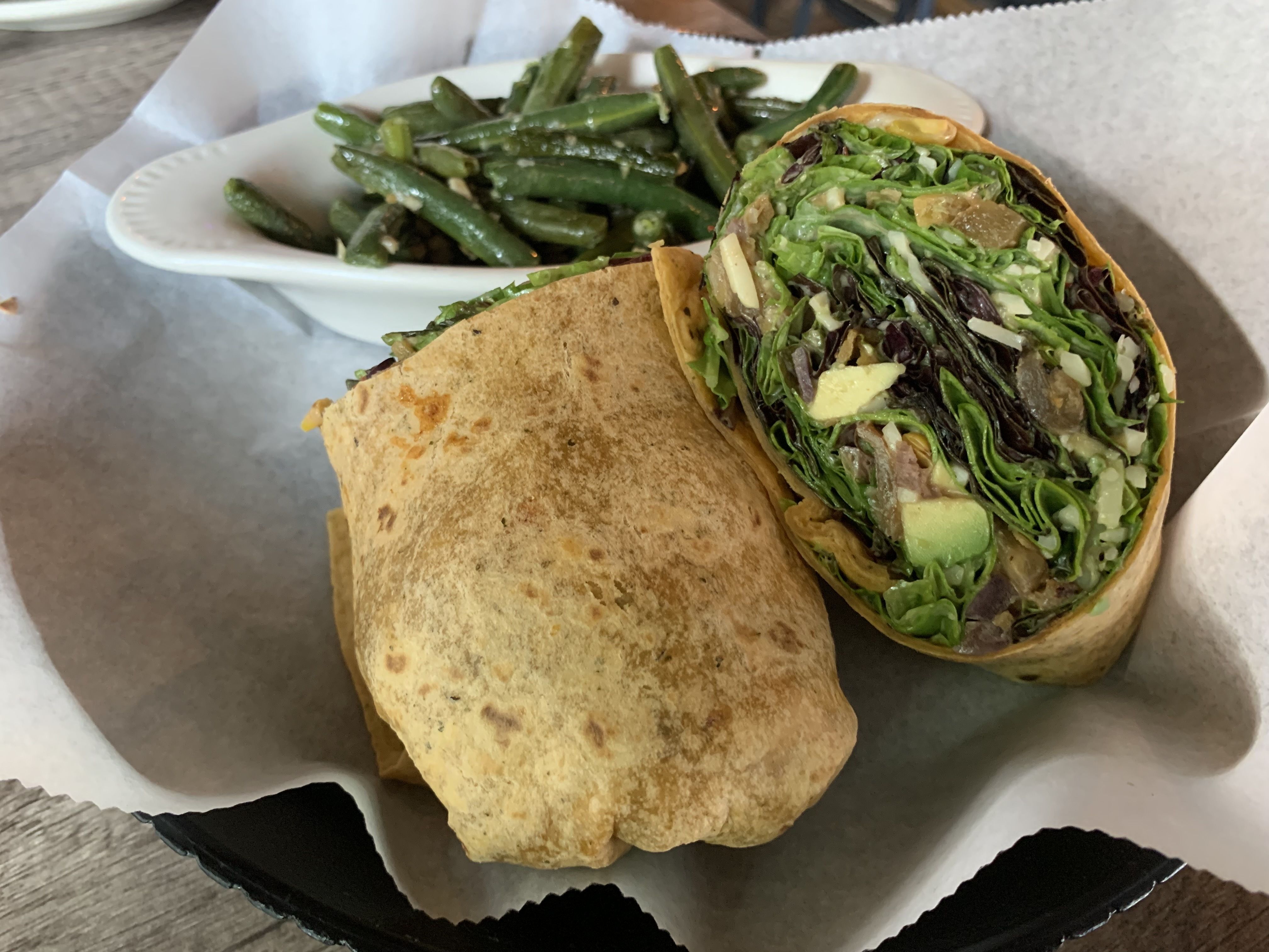 Photo of a sandwich wrap on a plate 