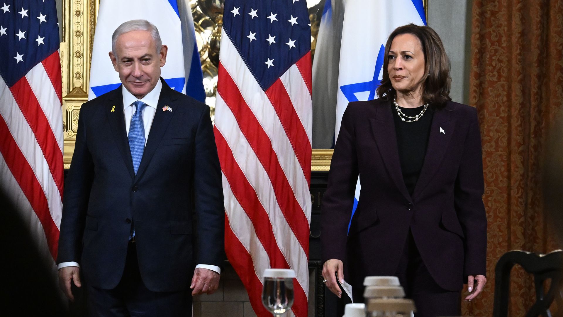 U.S. Vice President Kamala Harris and Israeli Prime Minister Benjamin Netanyahu look on before the start of a meeting in the Vice President's ceremonial office in the Eisenhower Executive Office Building on July 25, 2024 in Washington, DC. 