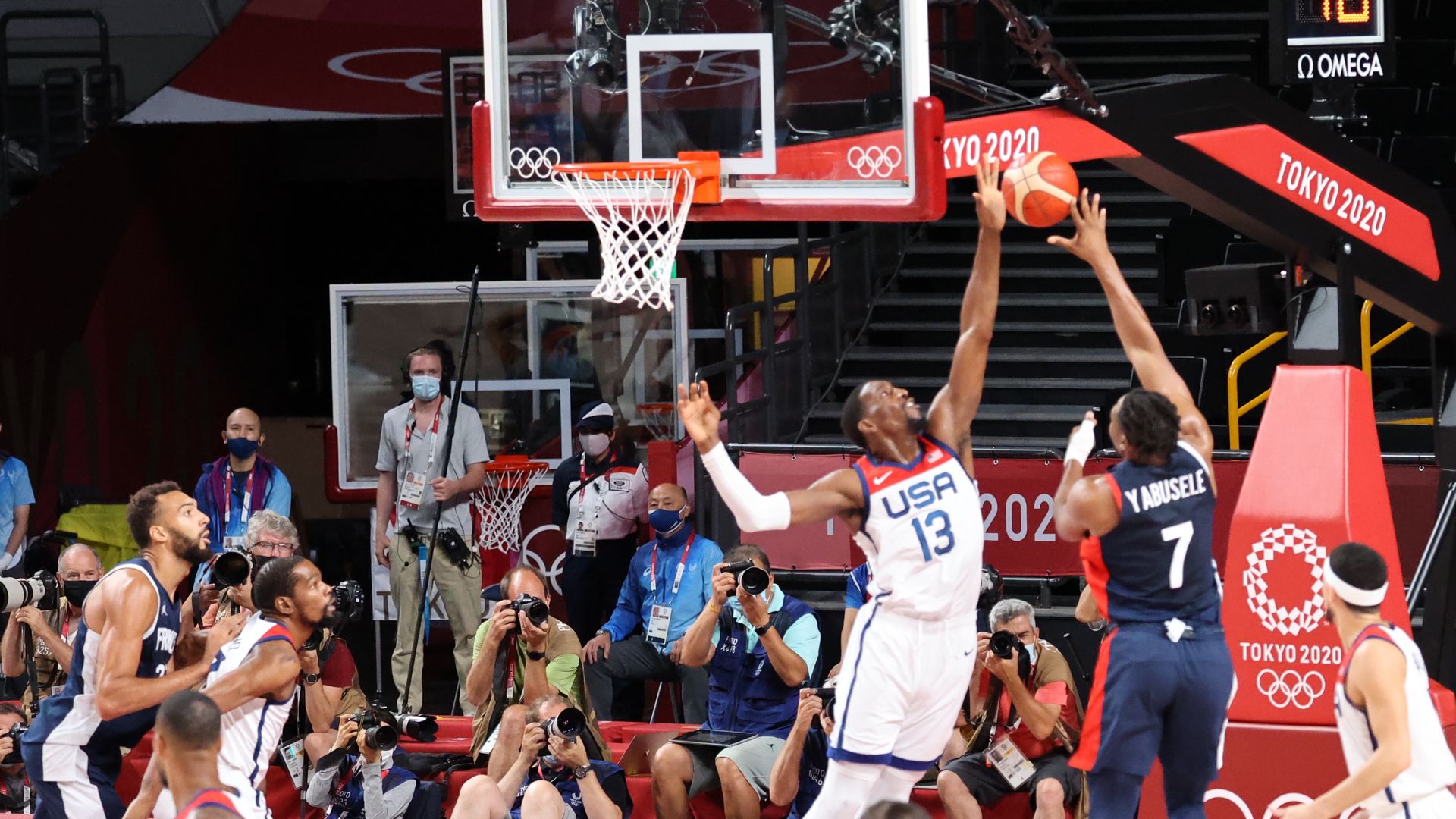 The U.S.' Bam Adebayo stops a France shot in the first half of the gold medal game at the Tokyo Olympics