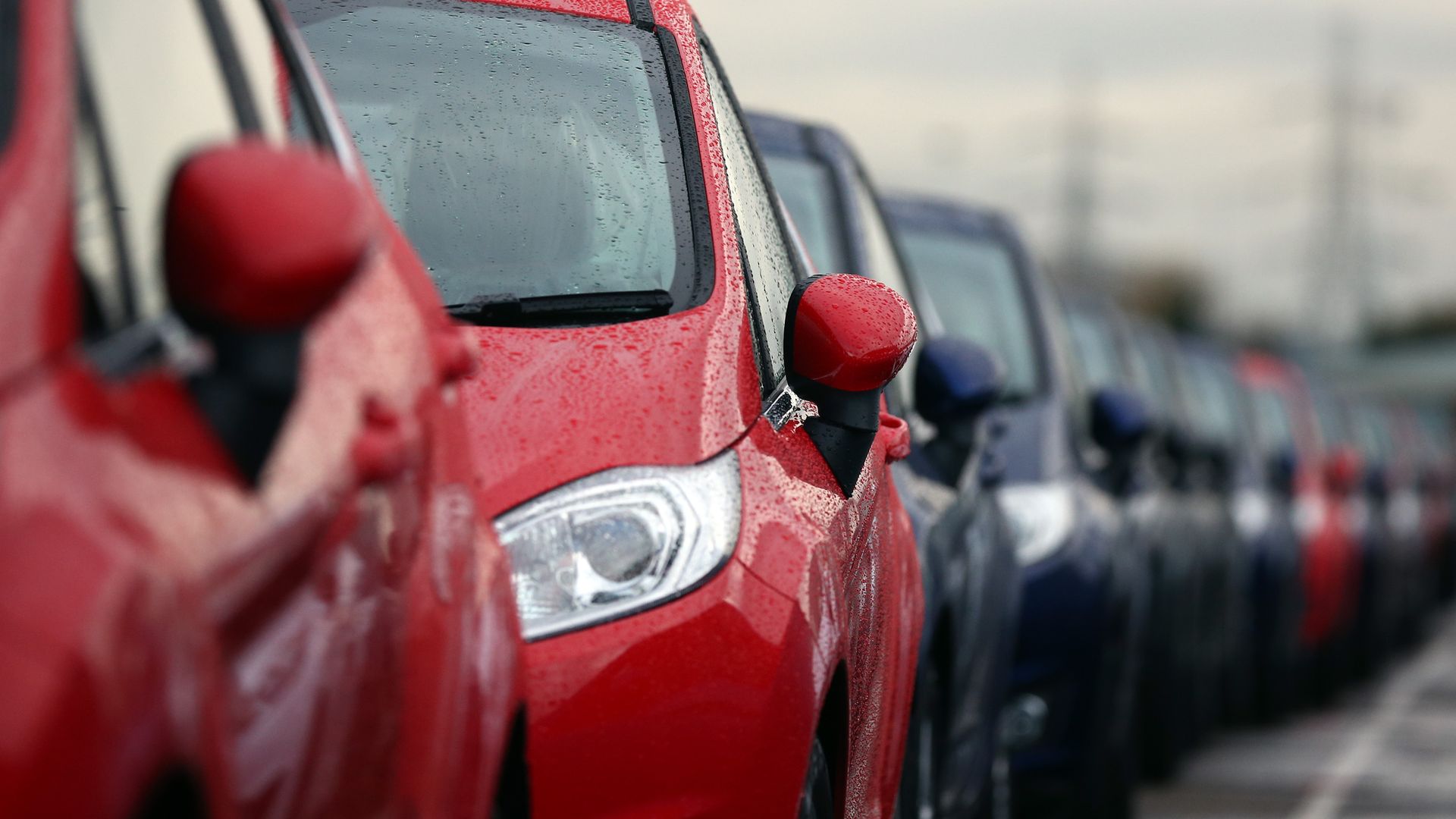 Cars lined up at a dealership