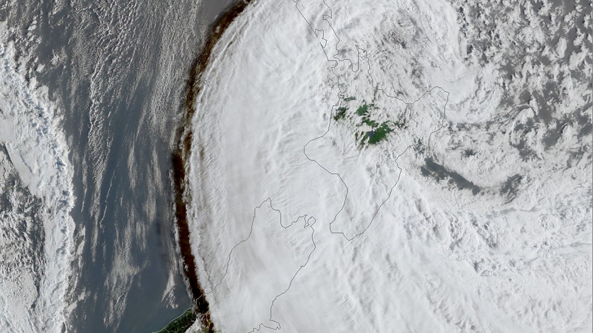 Satellite Imagery showing Cyclone Gabrielle centred east of New Zealand's Great Barrier Island, but the cloud sweep continues well past the NZ South Island city of Christchurch on Monday.