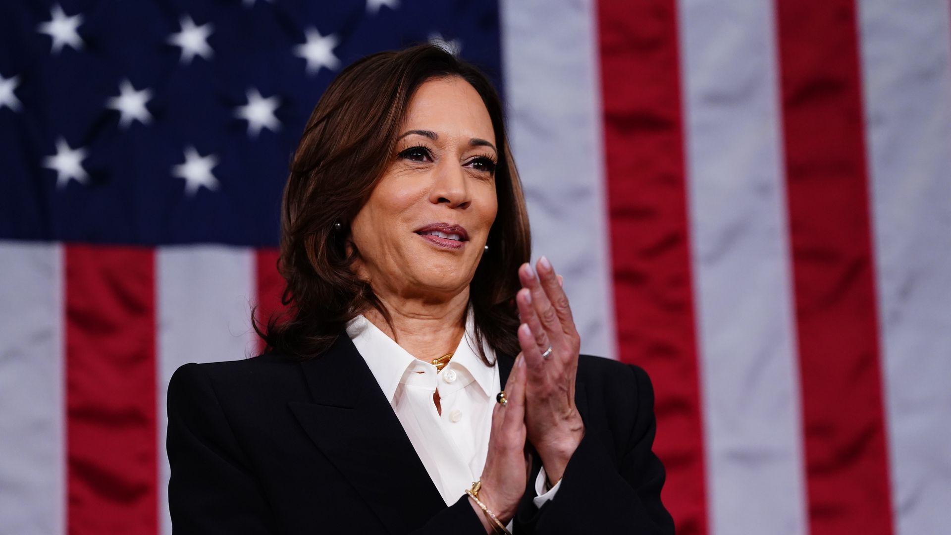Vice President Kamala Harris claps during the 2024 State of the Union address on Capitol Hill.