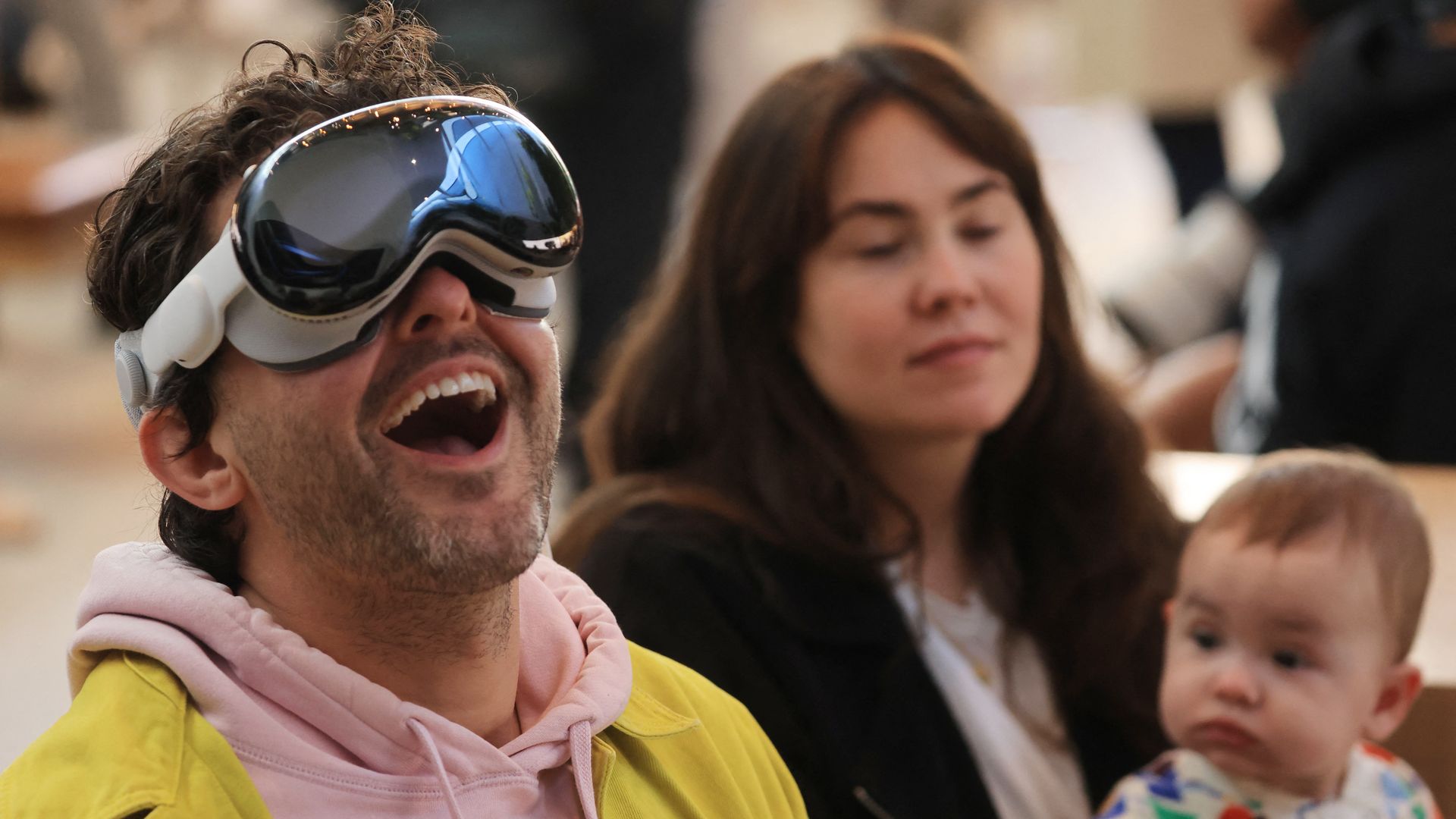 A customer tries his Vision Pro at the launch of the Apple Vision Pro at Apple The Grove in Los Angeles, California, on February 2, 2024.