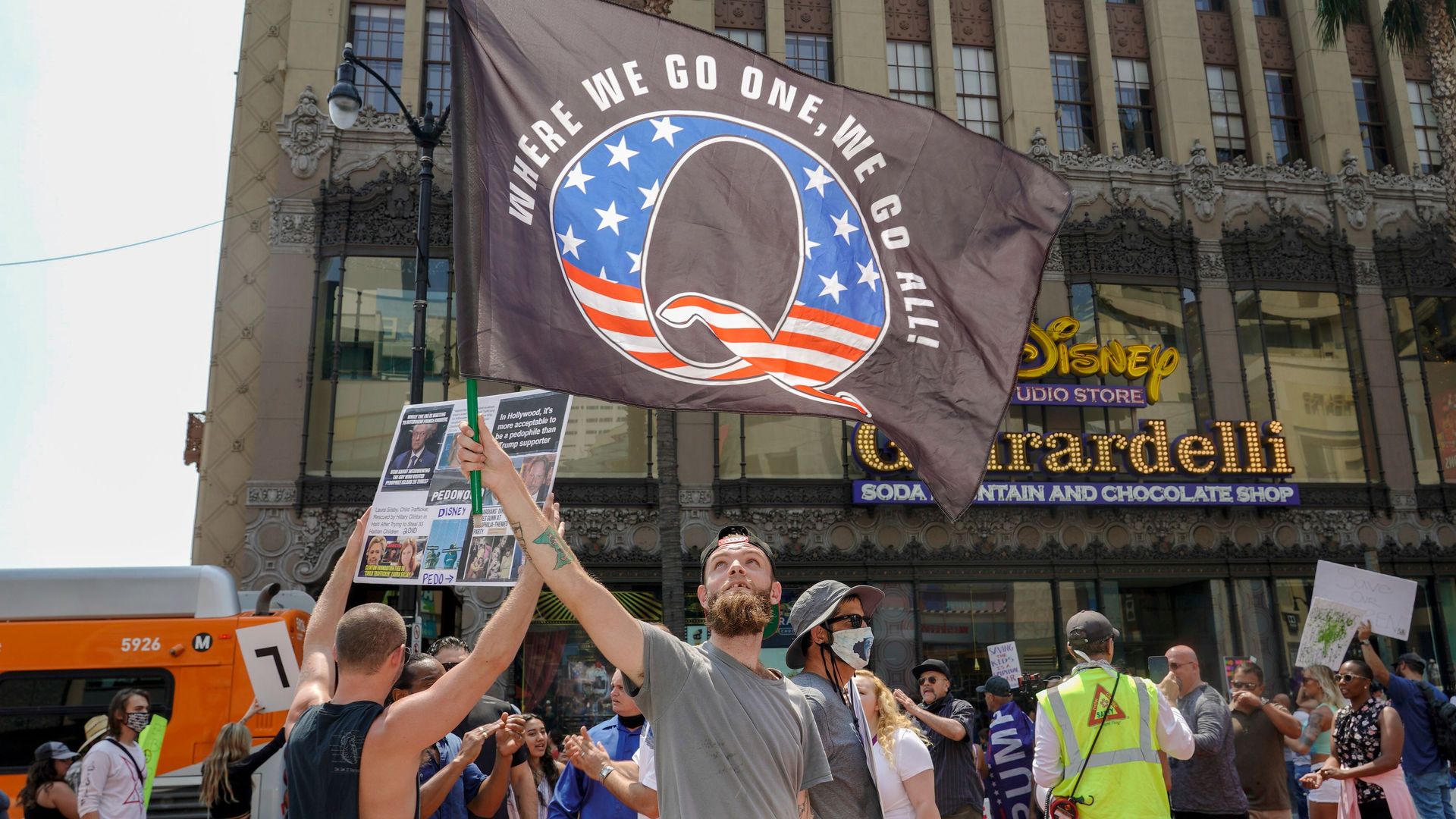 QAnon supporters protesting in Los Angeles in August.