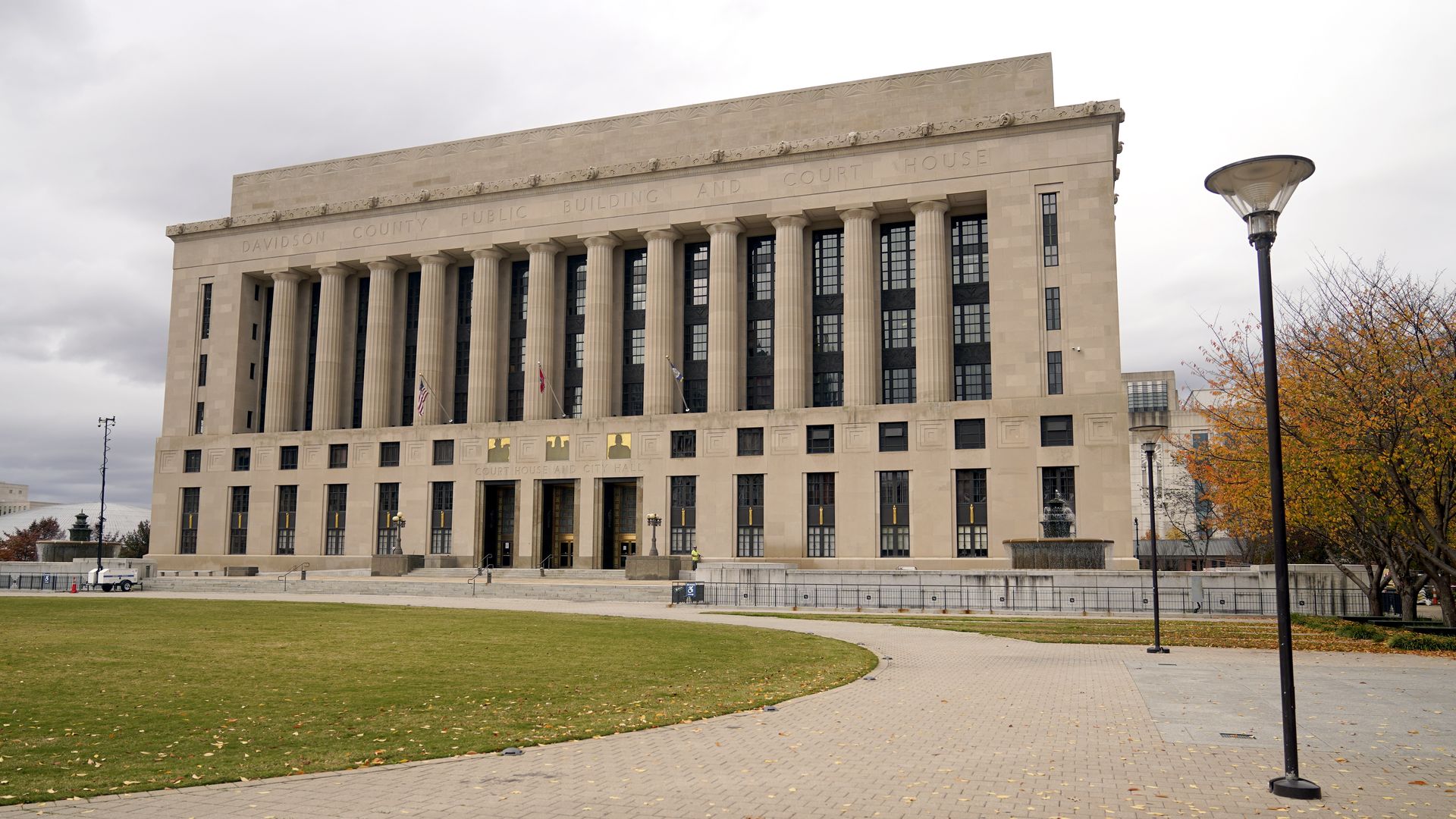 courthouse building with a green lawn out front