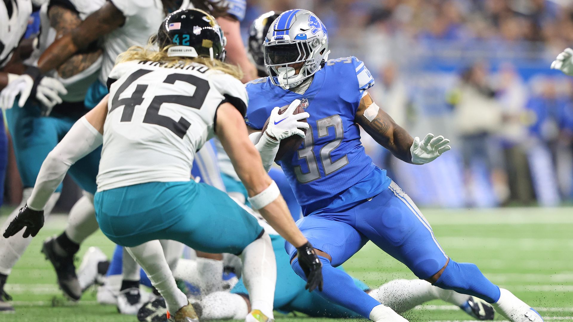 Lions running back D'Andre Swift looks for a running lane. 