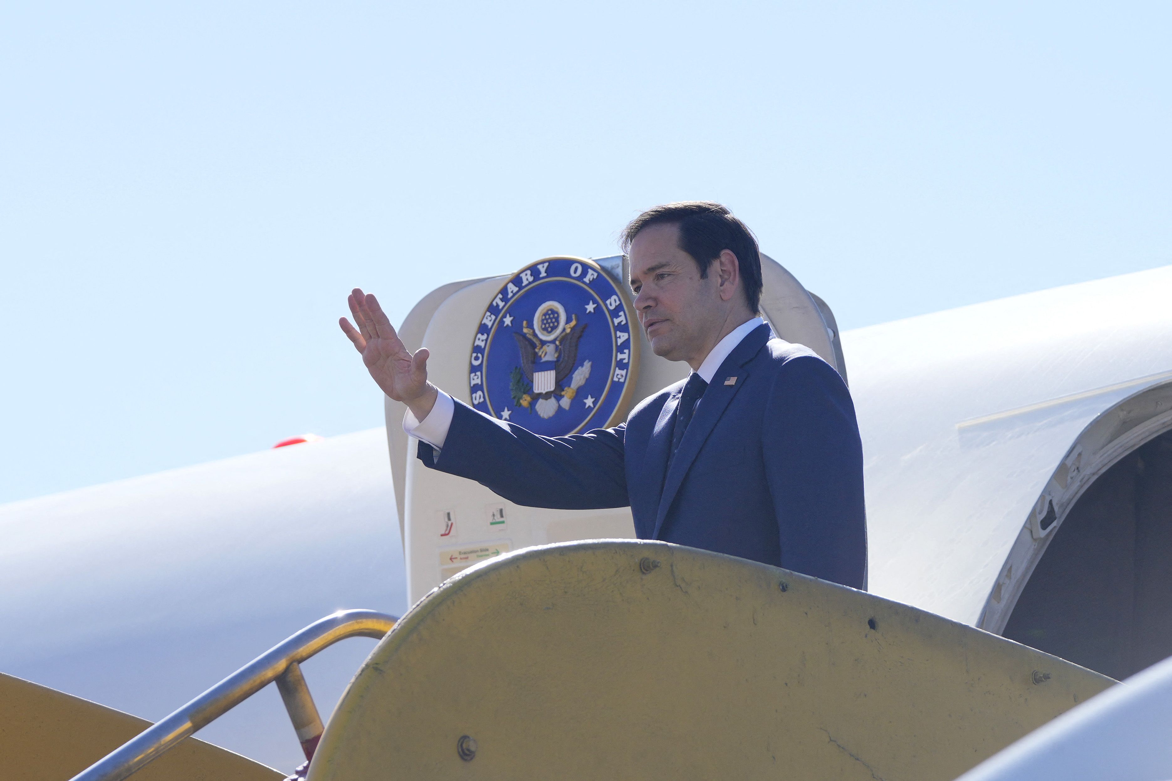 US Secretary of State Marco Rubio waves before departing from La Aurora International Airport in Guatemala City, on February 5, 2025, en route to the Dominican Republic. (Photo by Mark Schiefelbein / POOL / AFP) (Photo by MARK SCHIEFELBEIN/POOL/AFP via Getty Images)