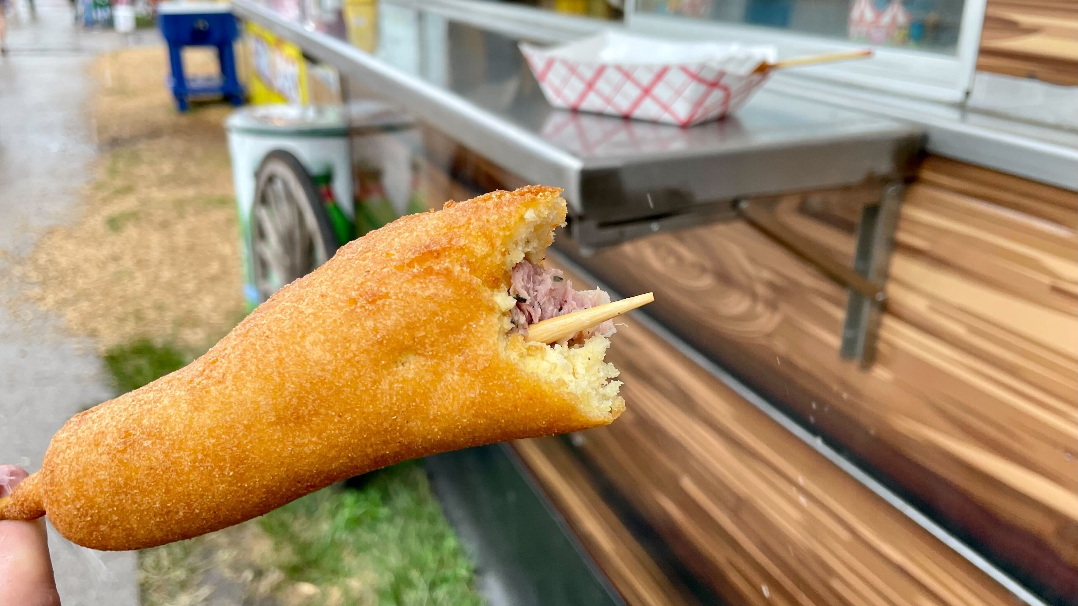 Alligator corn dog on a stick