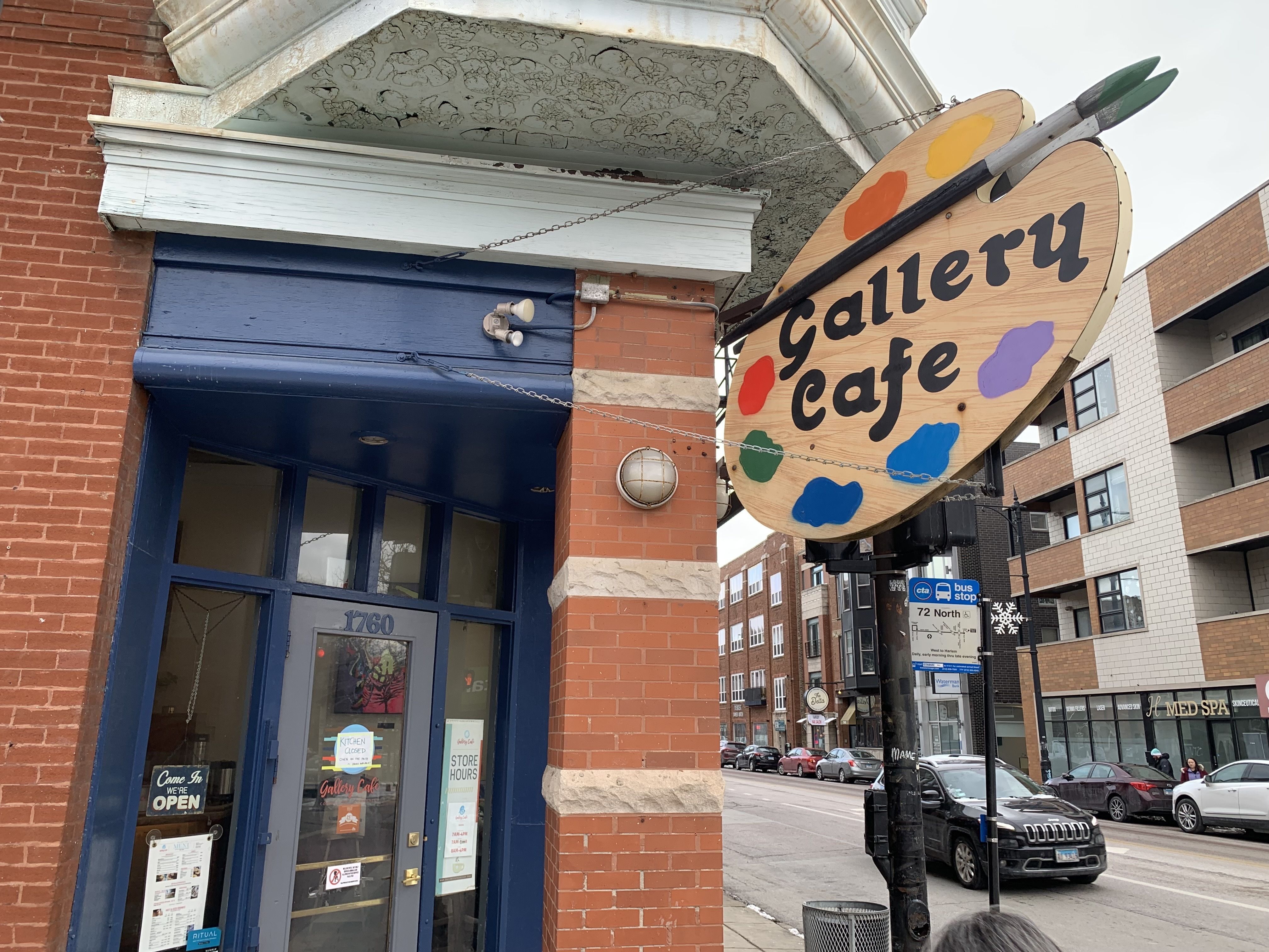 Photo of a storefront with a sign that says "Gallery Cafe" 