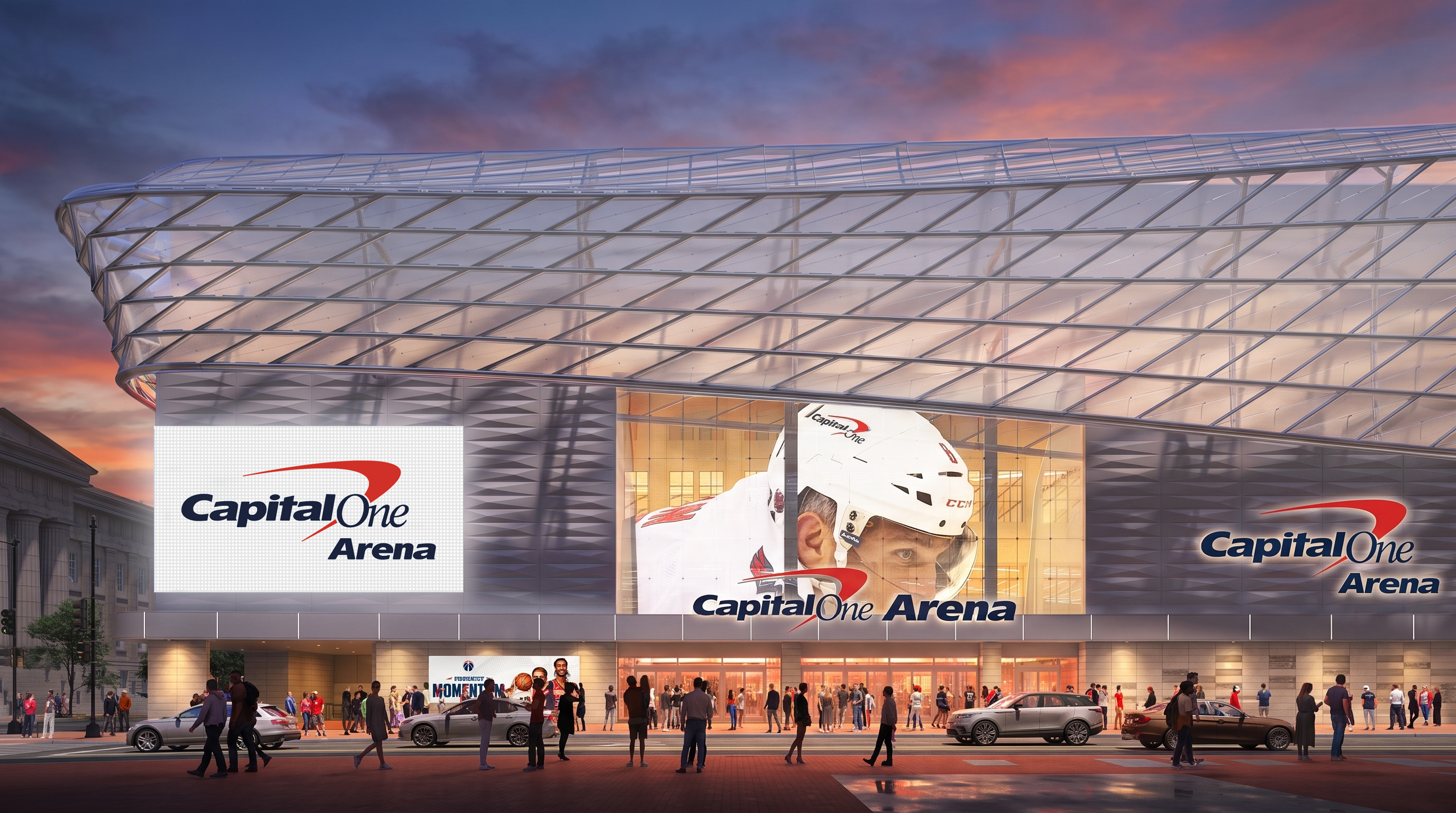 Exterior of the Capital One Arena at sunset, featuring a glass-and-metal facade with diagonal framing. A purple-pink sky, large screens showing the arena logo, and crowds with cars on the plaza.