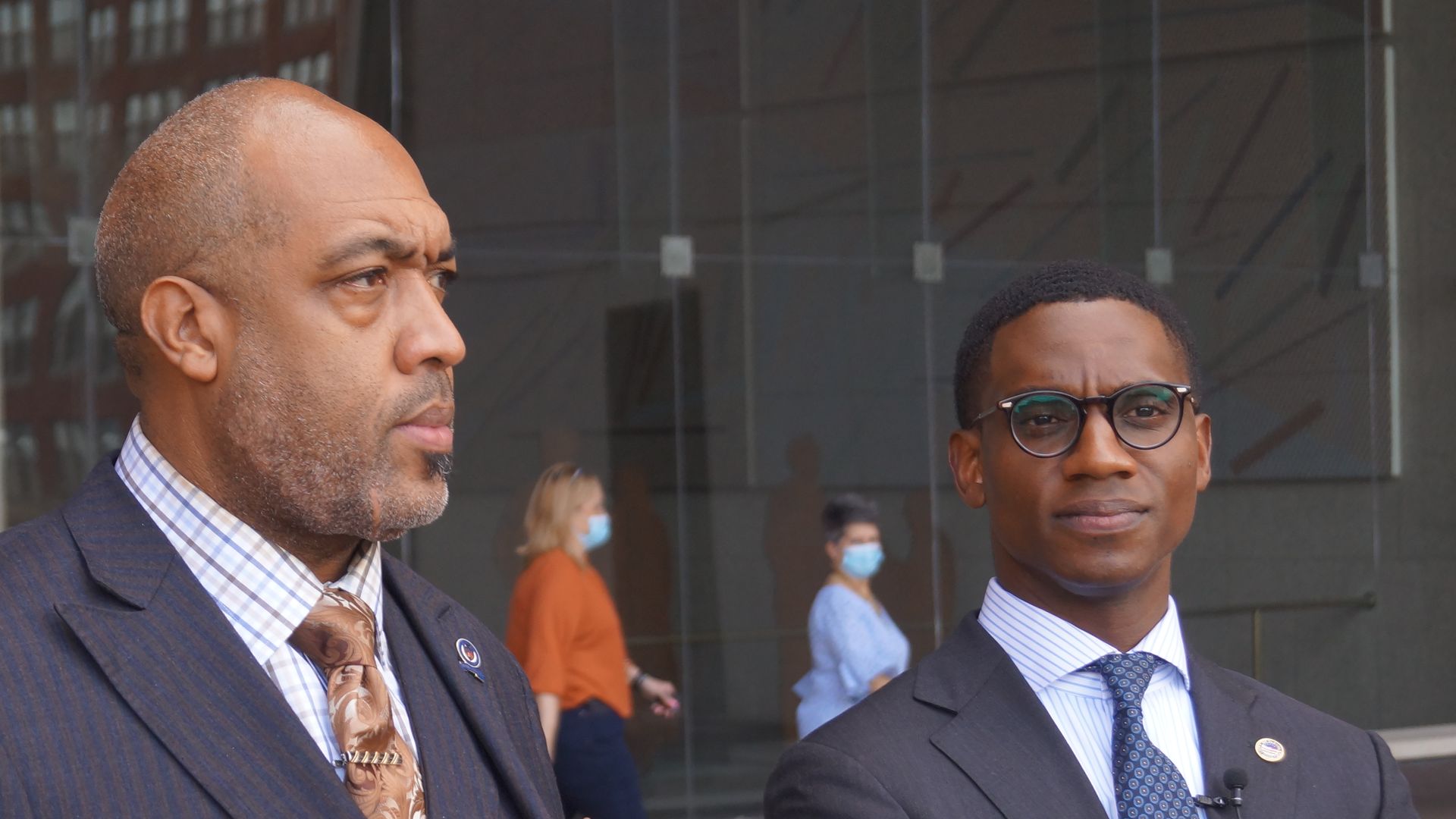 Blaine Griffin and Justin Bibb stand outside the Cuyahoga County Justice Center.
