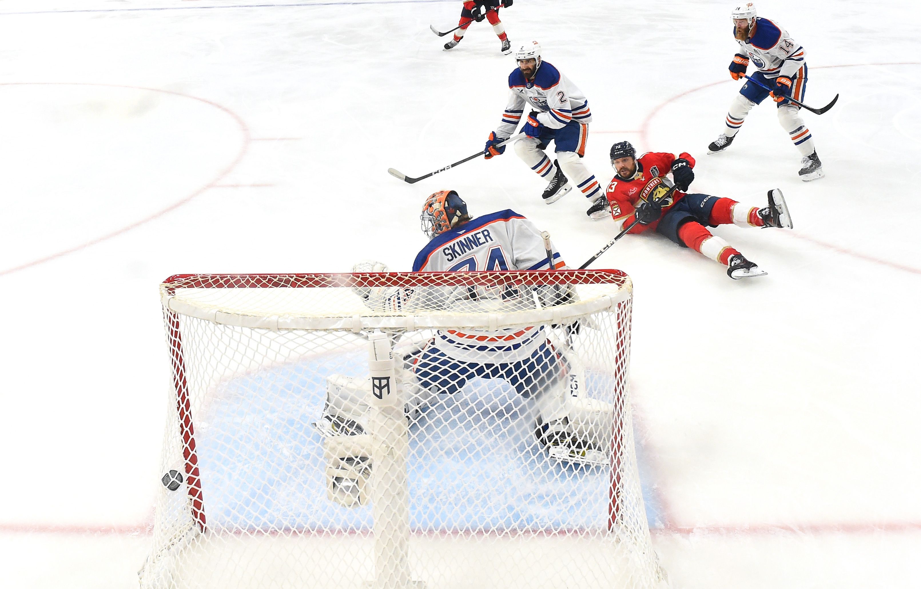 SUNRISE, FLORIDA - JUNE 17: Sam Reinhart #13 of the Florida Panthers scores against Stuart Skinner #74 of the Edmonton Oilers in the first period of Game Six of the 2025 Stanley Cup Final between the Edmonton Oilers and the Florida Panthers at Amerant Bank Arena on June 17, 2025 in Sunrise, Florida.