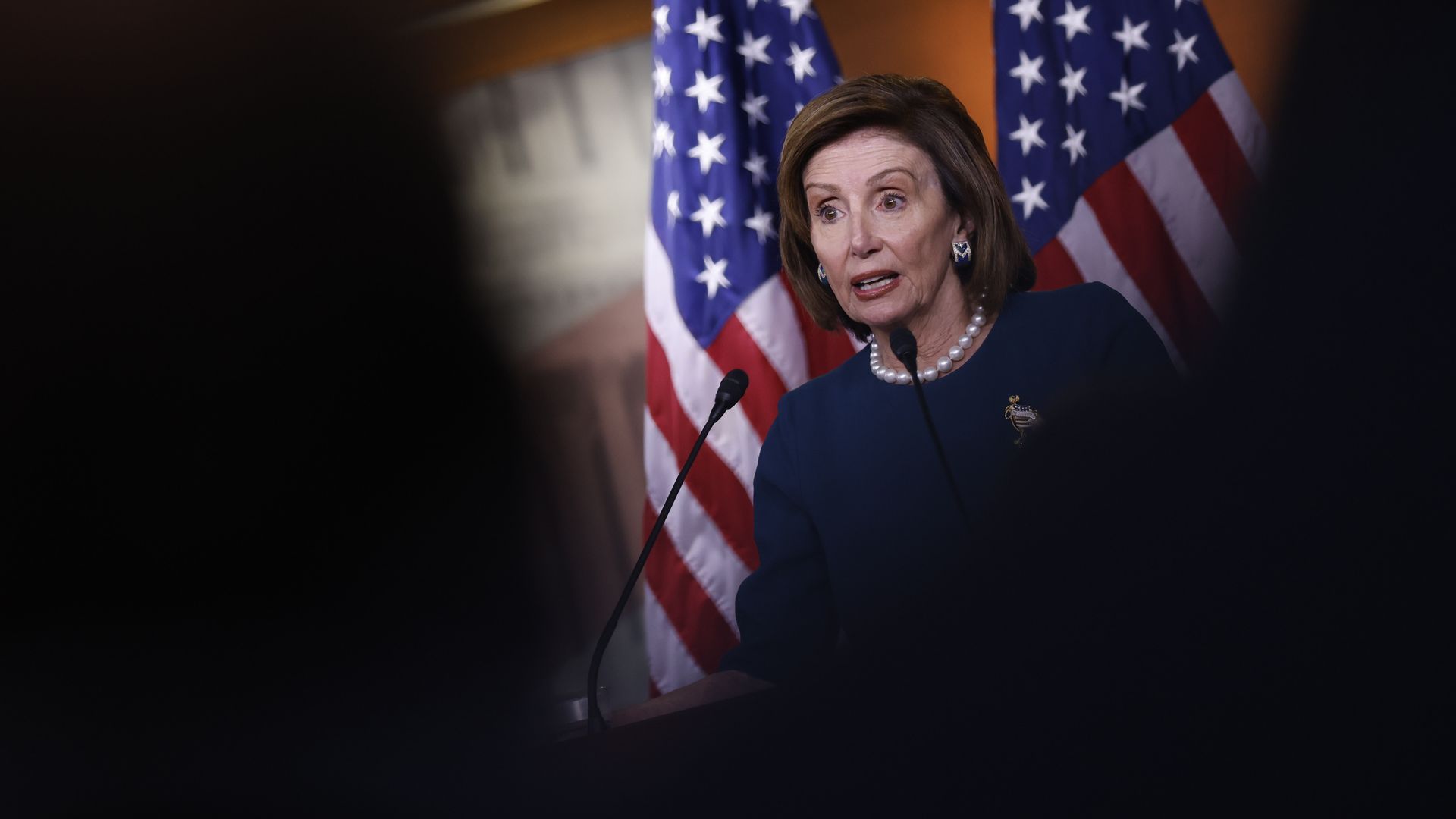 House Speaker Nancy Pelosi is seen speaking during a news conference.