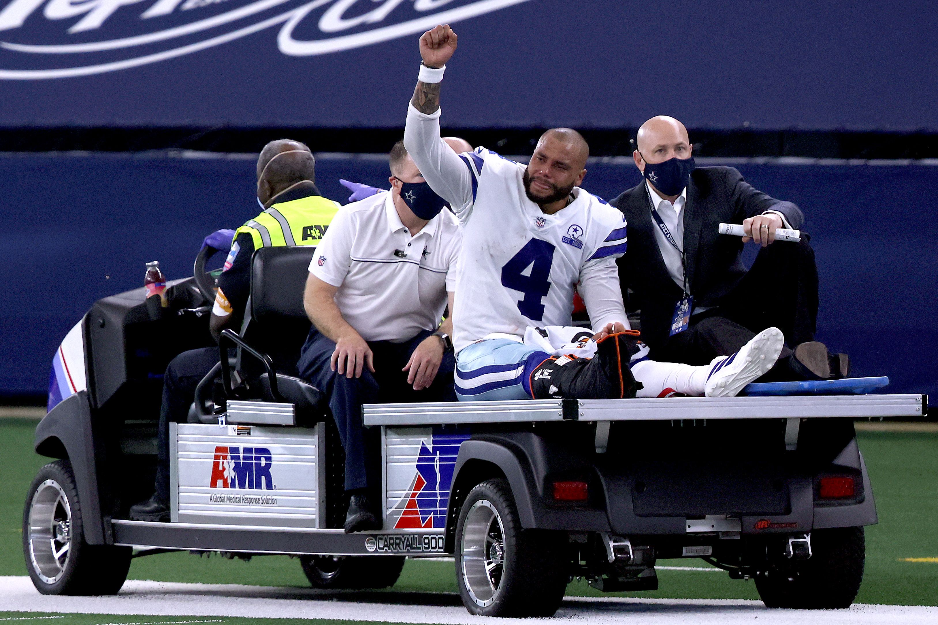 Dak Prescott being carted off